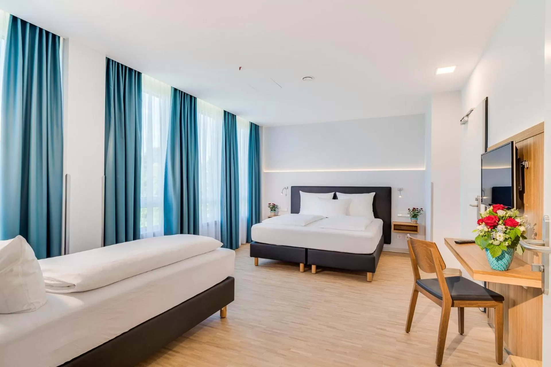 Bed in Hotel-Etage Apfelrot managed by Hotel Apfelbaum