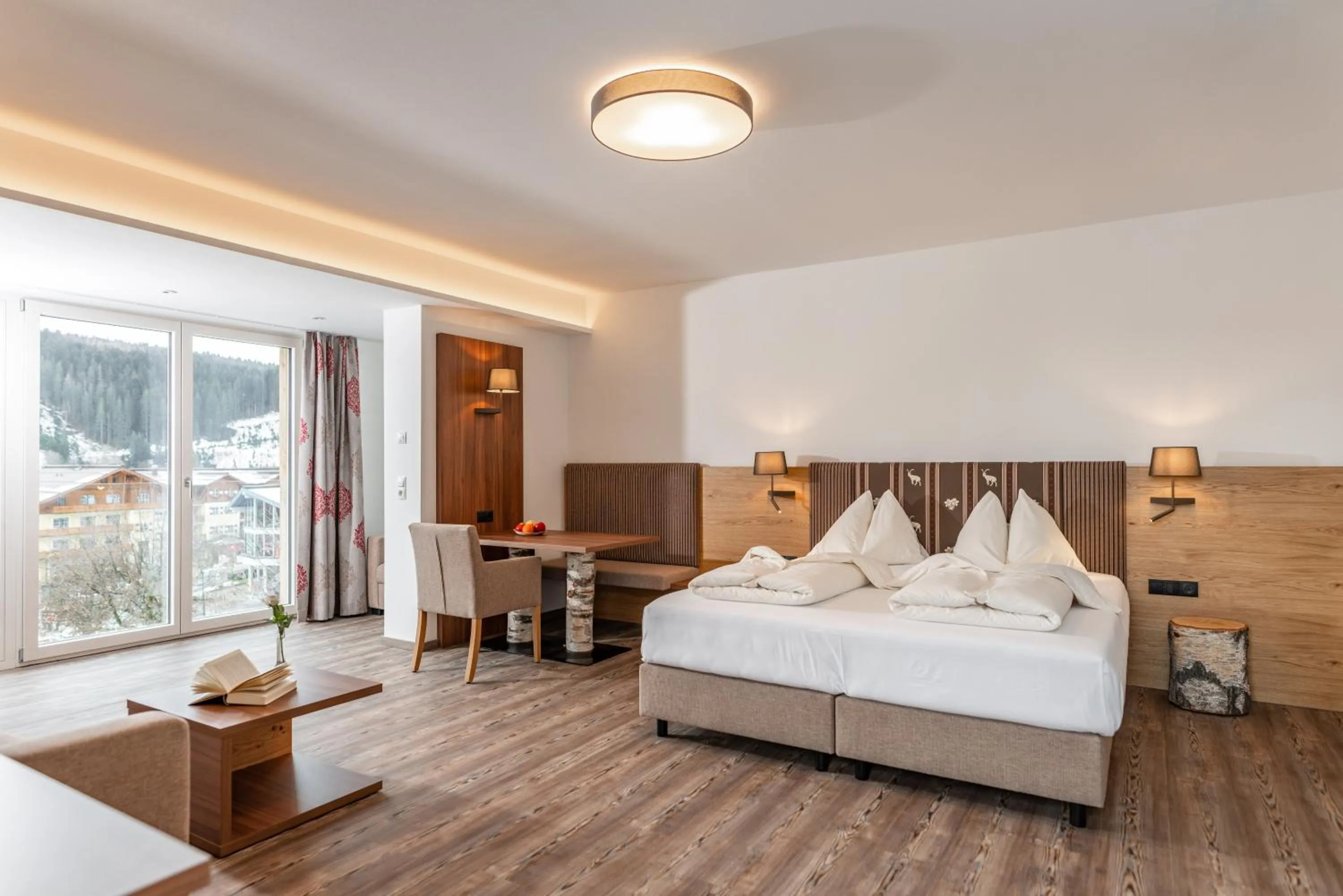 Photo of the whole room, Bed in Aktivhotel Pehab - Dachstein Rooftop-Spa