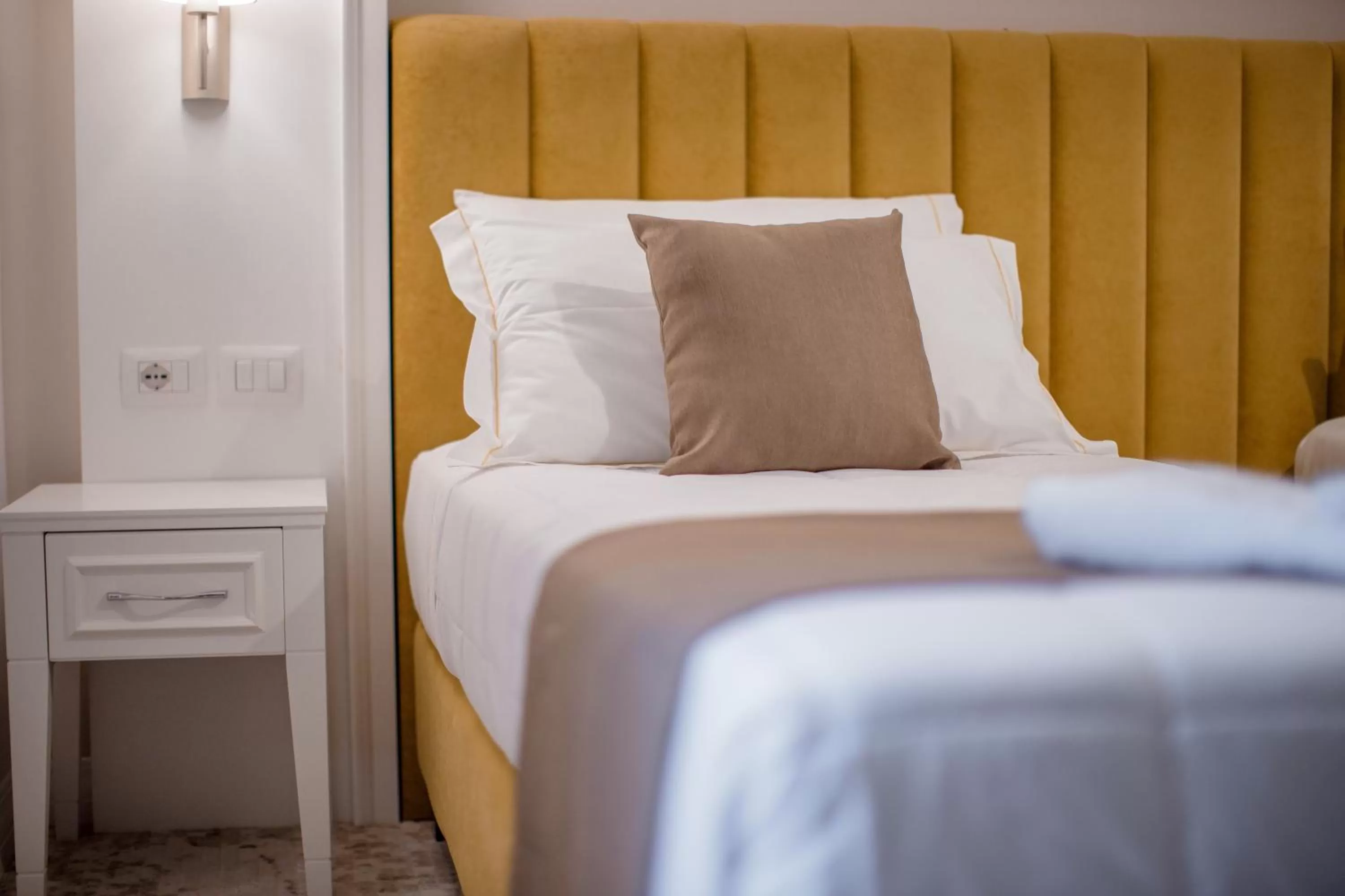 Bed in ART Hotel Tirana