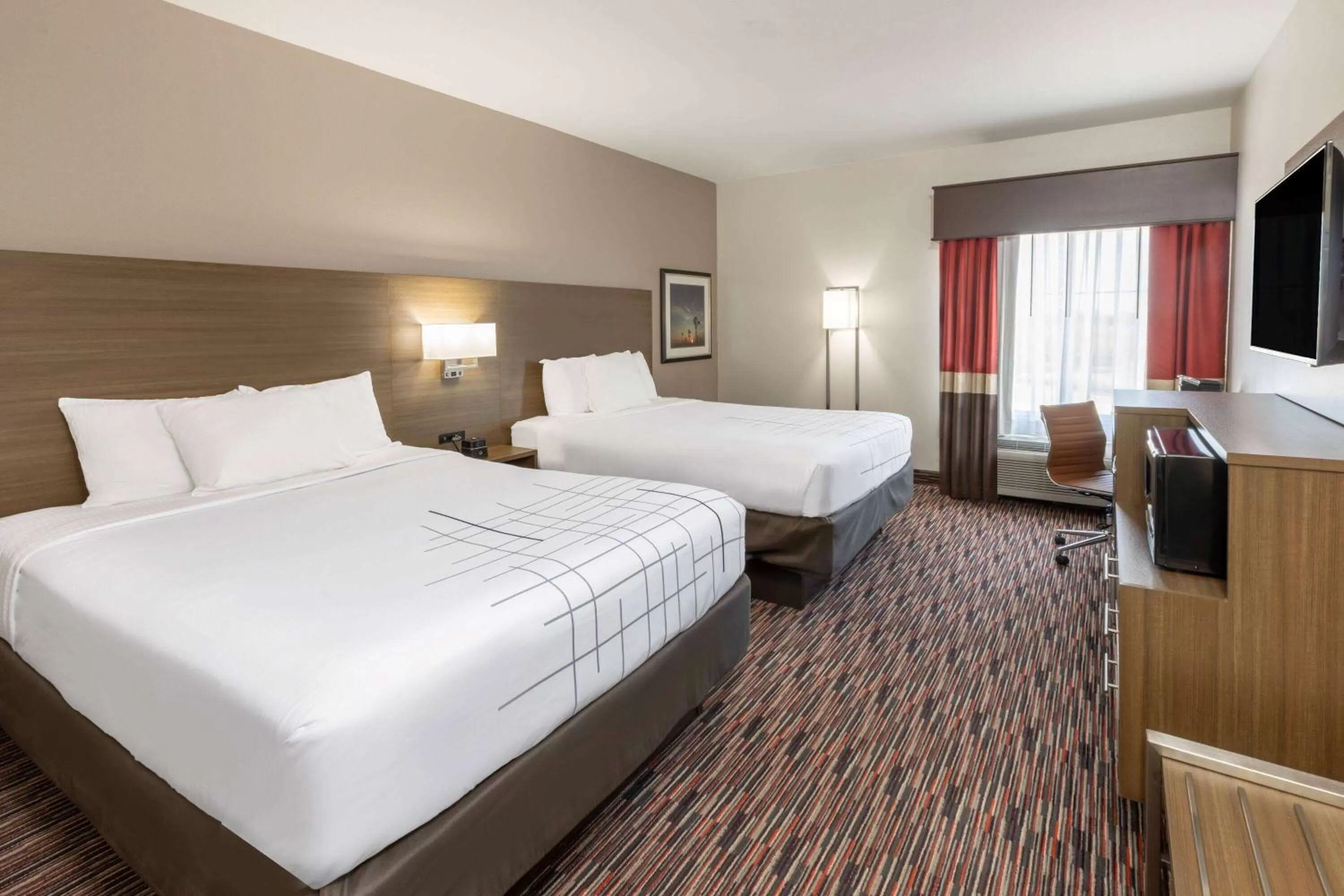 Photo of the whole room, Bed in La Quinta by Wyndham Wichita Falls - MSU Area