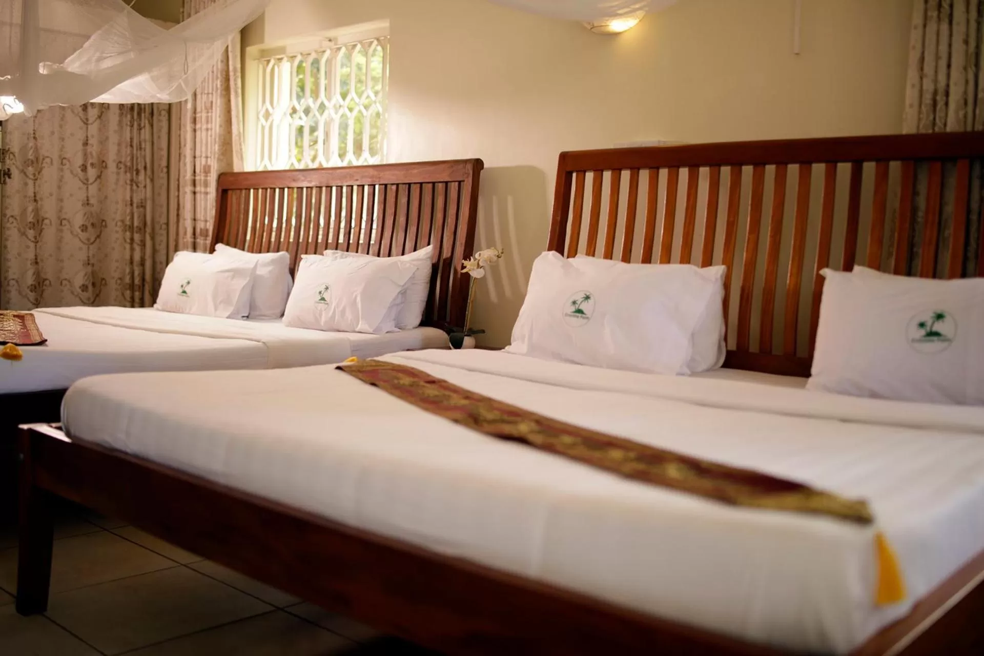 Bedroom, Bed in Entebbe Palm Hotel