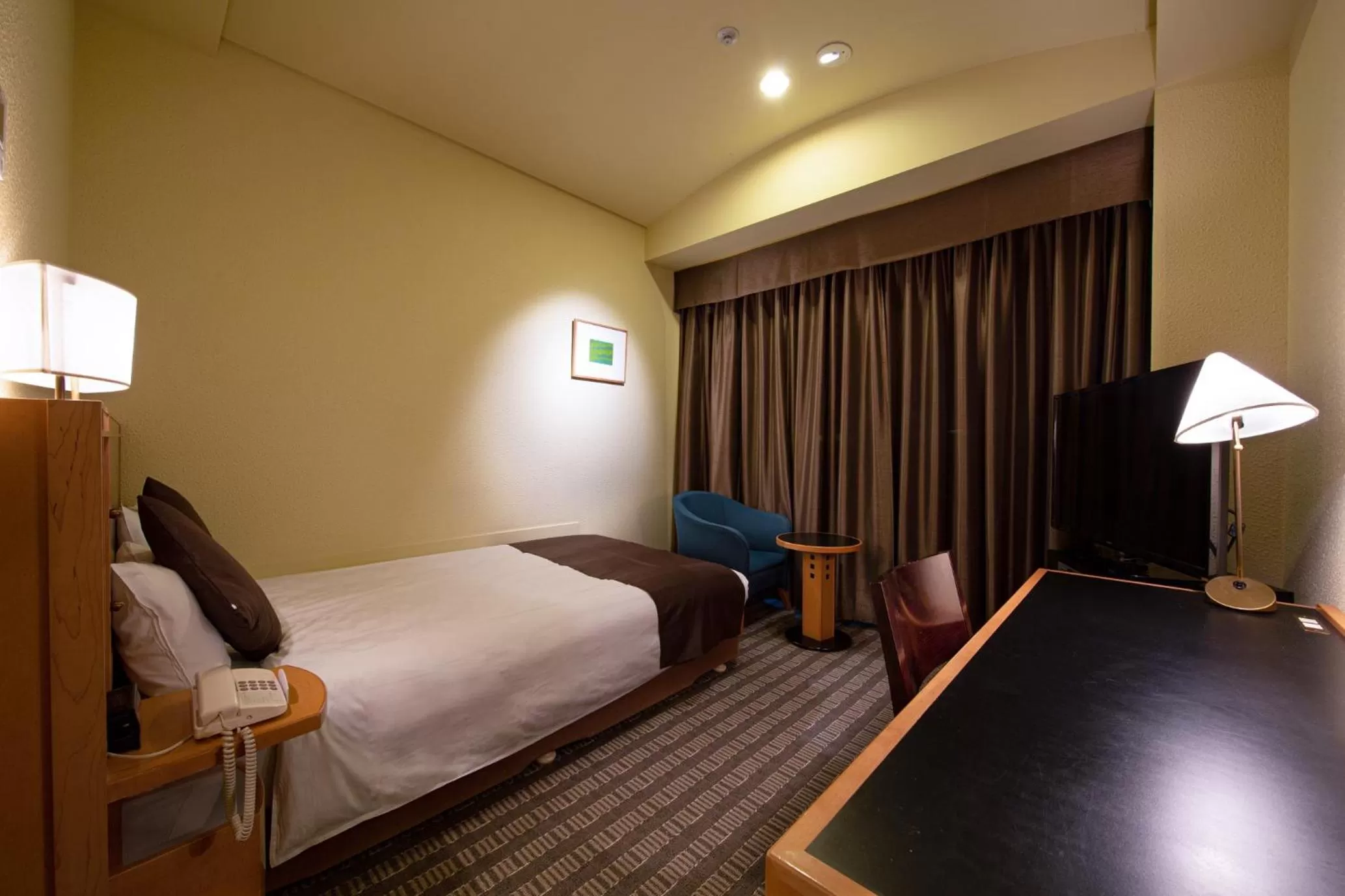 Bed in Hotel Nagoya Garden Palace