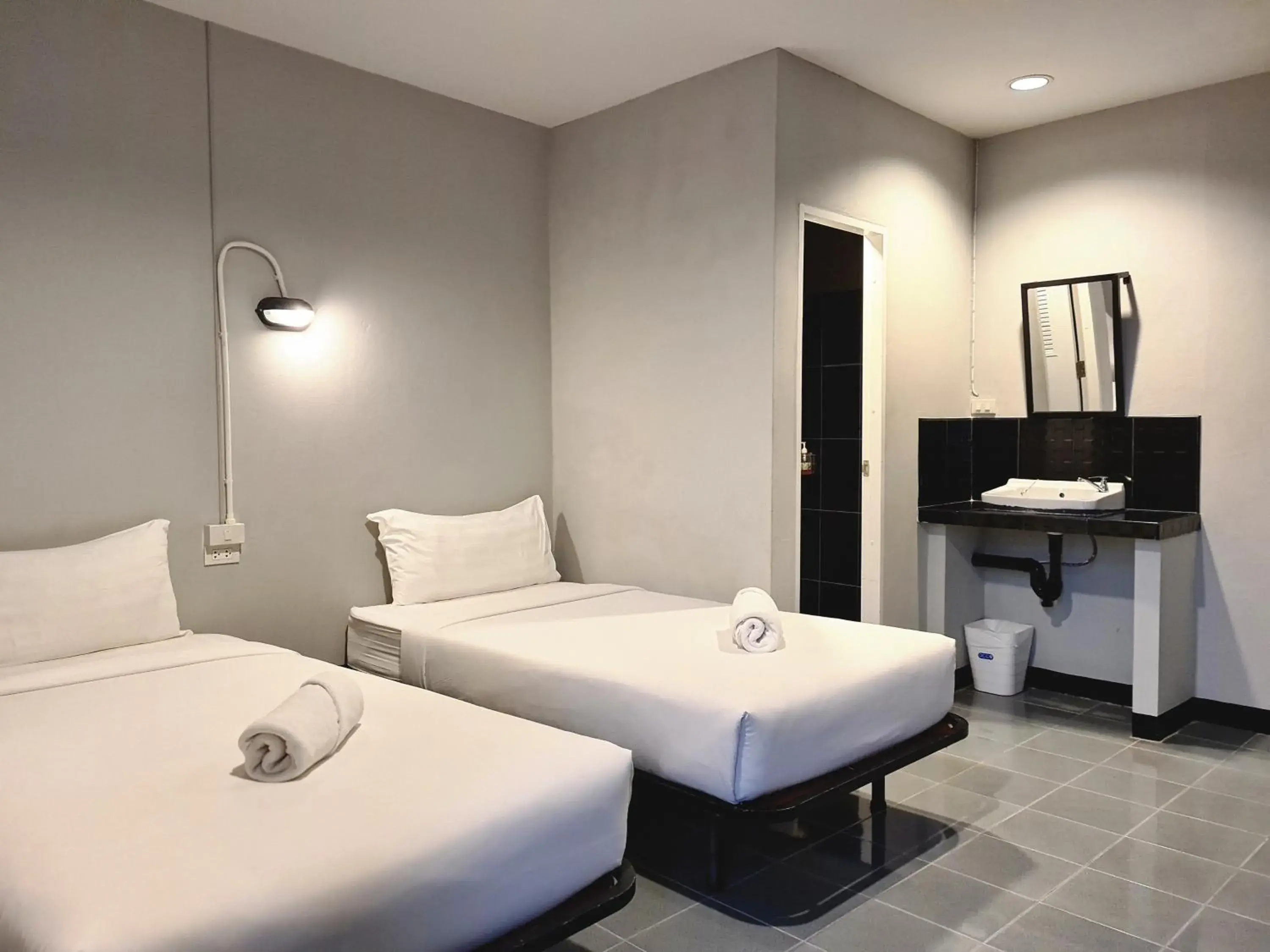 Budget Twin Room with Private Bathroom in The 8 Factory Hotel Phitsanulok Budget Twin Room with Private Bathroom in The 8 Factory Hotel Phitsanulok