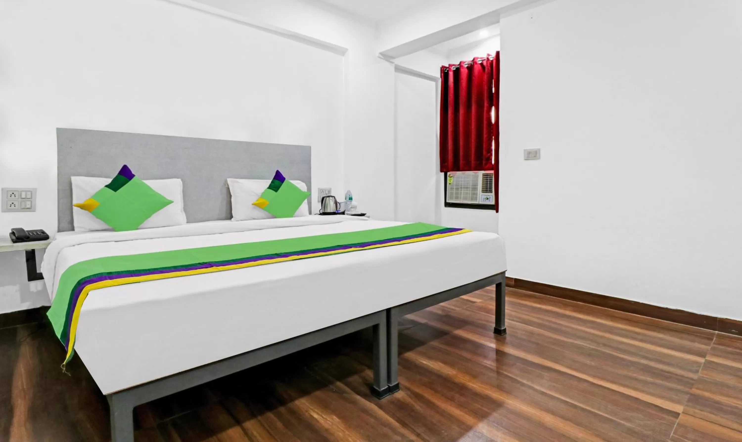 Bedroom, Bed in Treebo Grand Town House