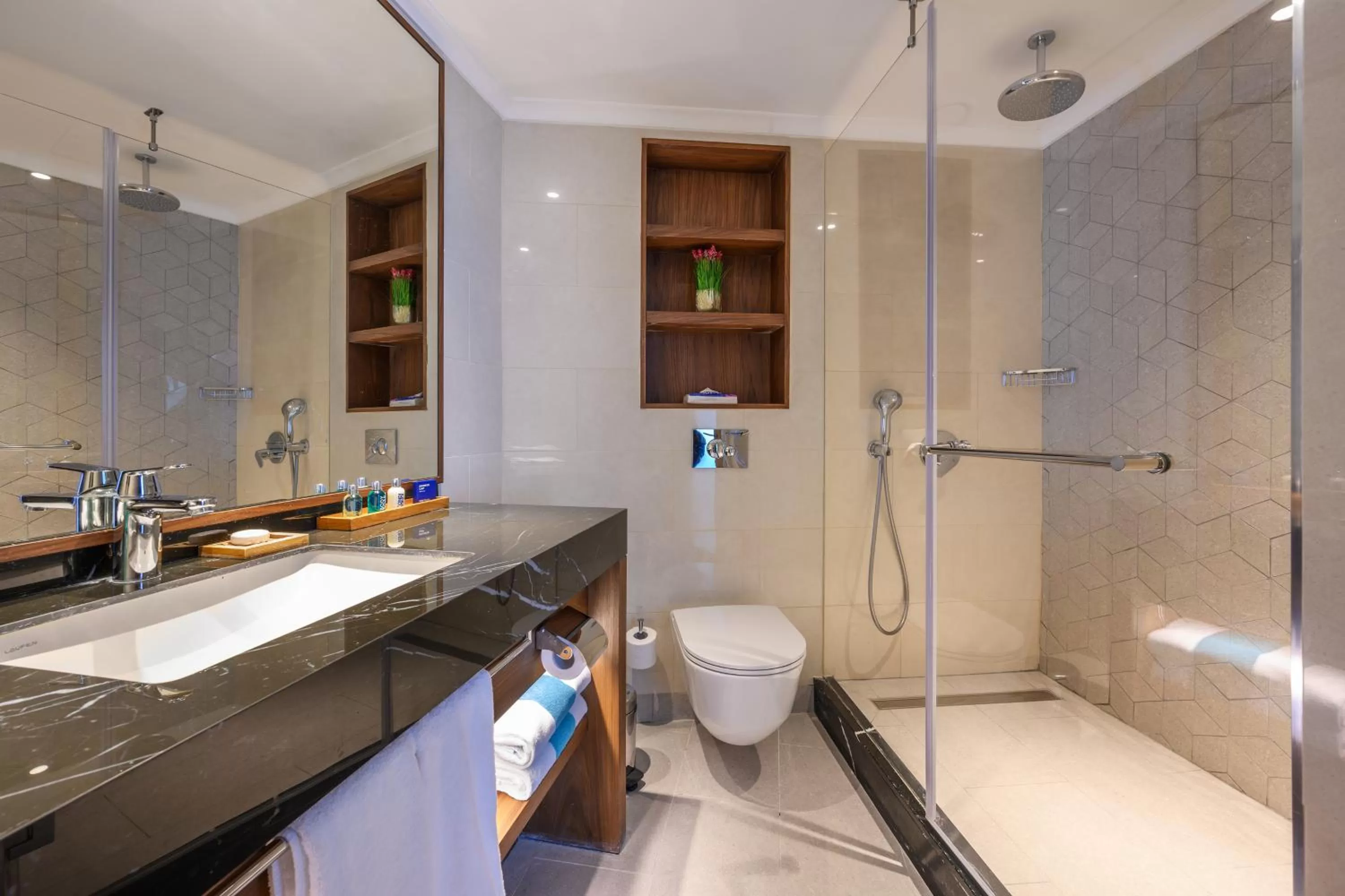 Bathroom in Sea Tower by Isrotel Design