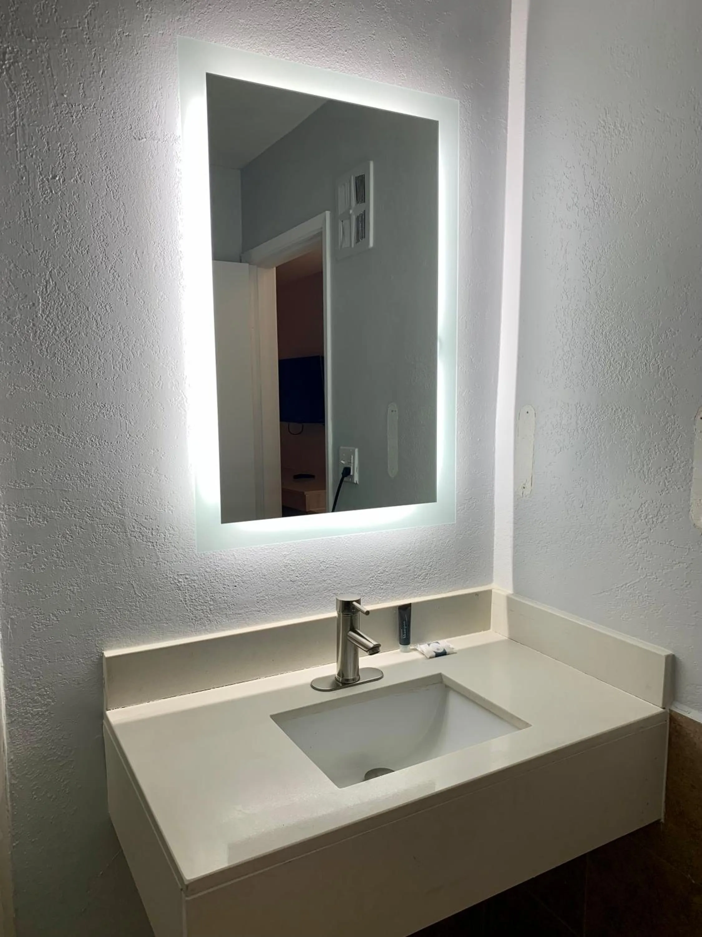 Bathroom in Executive Inn Midland