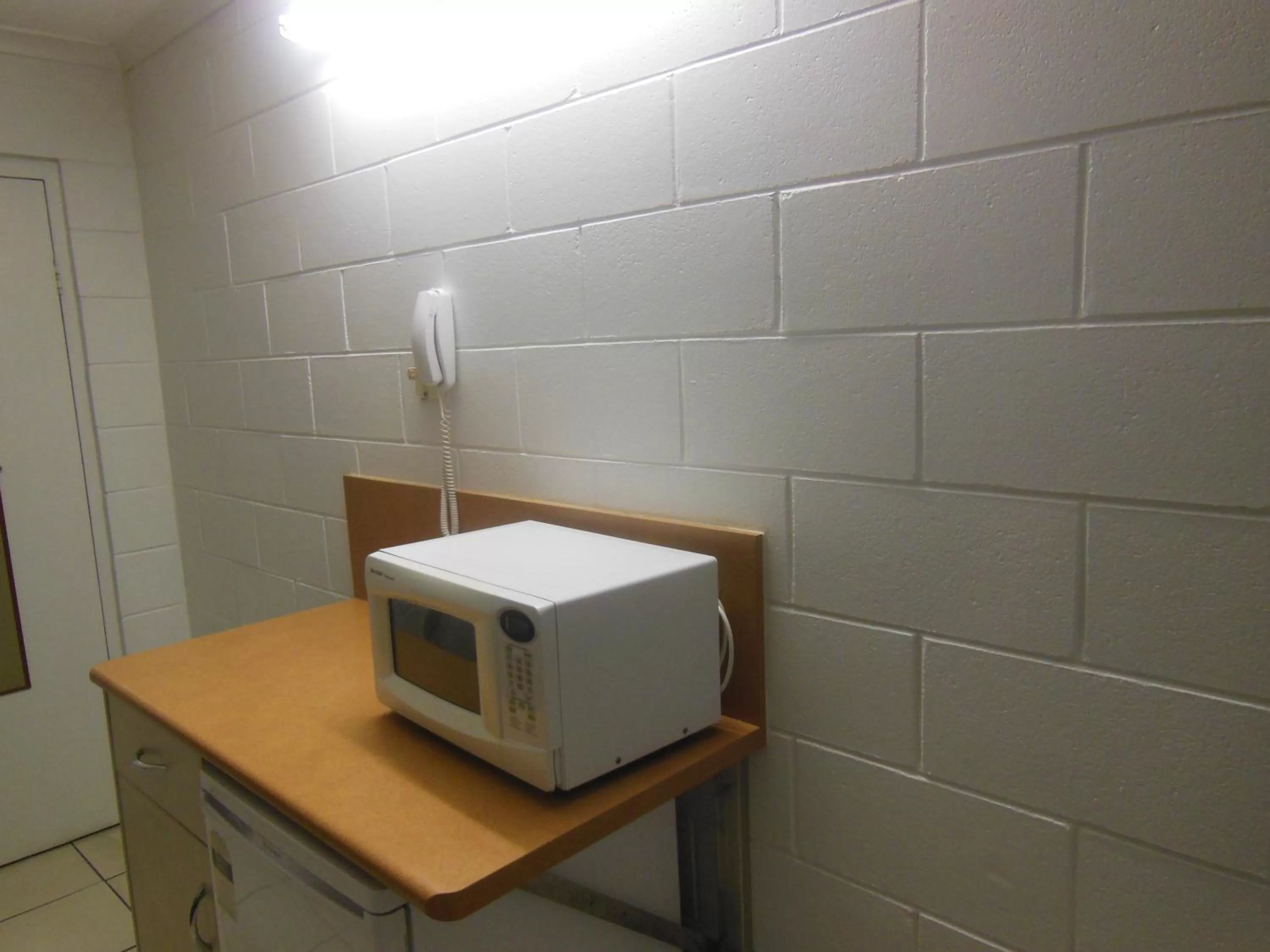 Kitchen or kitchenette in Country Road Motel