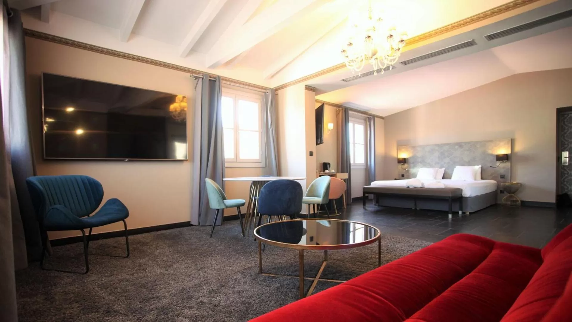 Living room, Bed in Hotel POZZO DI BORGO