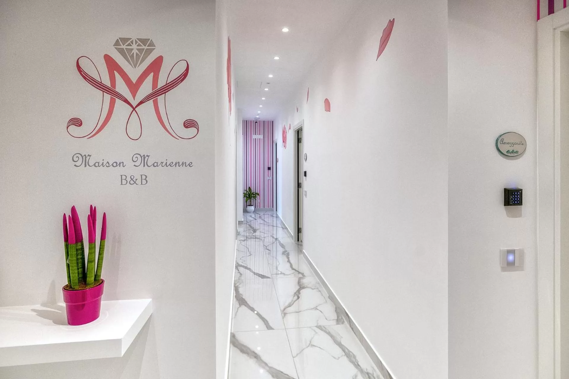 Property logo or sign in Maison Marienne - Deluxe B&B