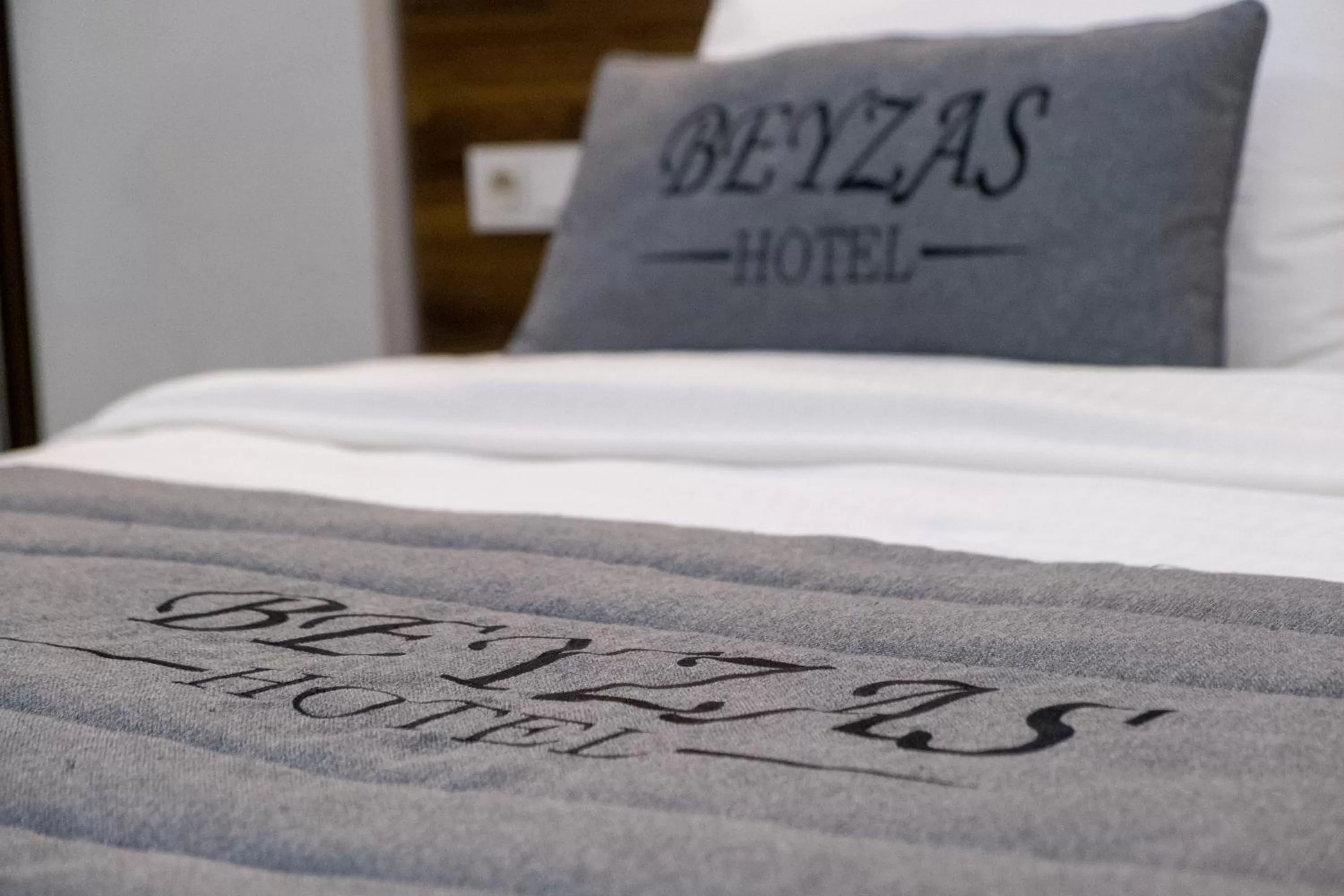 Bed, Property Logo/Sign in Beyzas Hotels & Suites