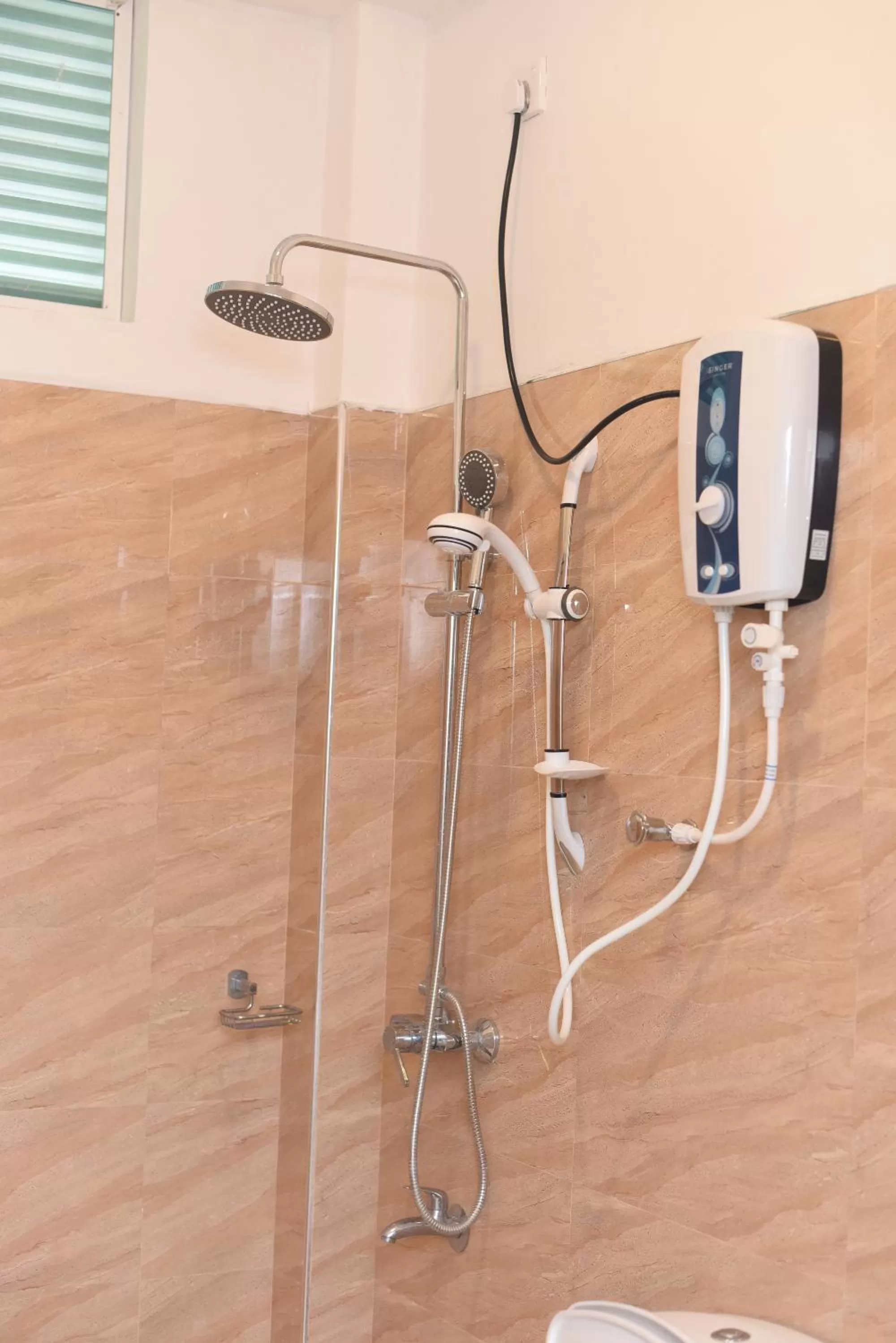 Shower in Kithmi Resort