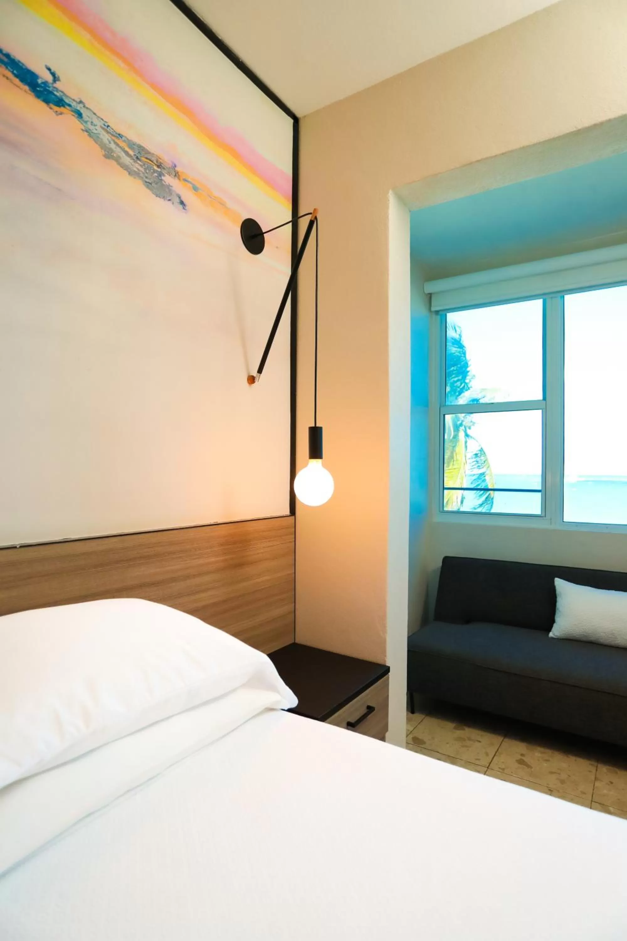 Bedroom, Bed in The Tryst Beachfront Hotel