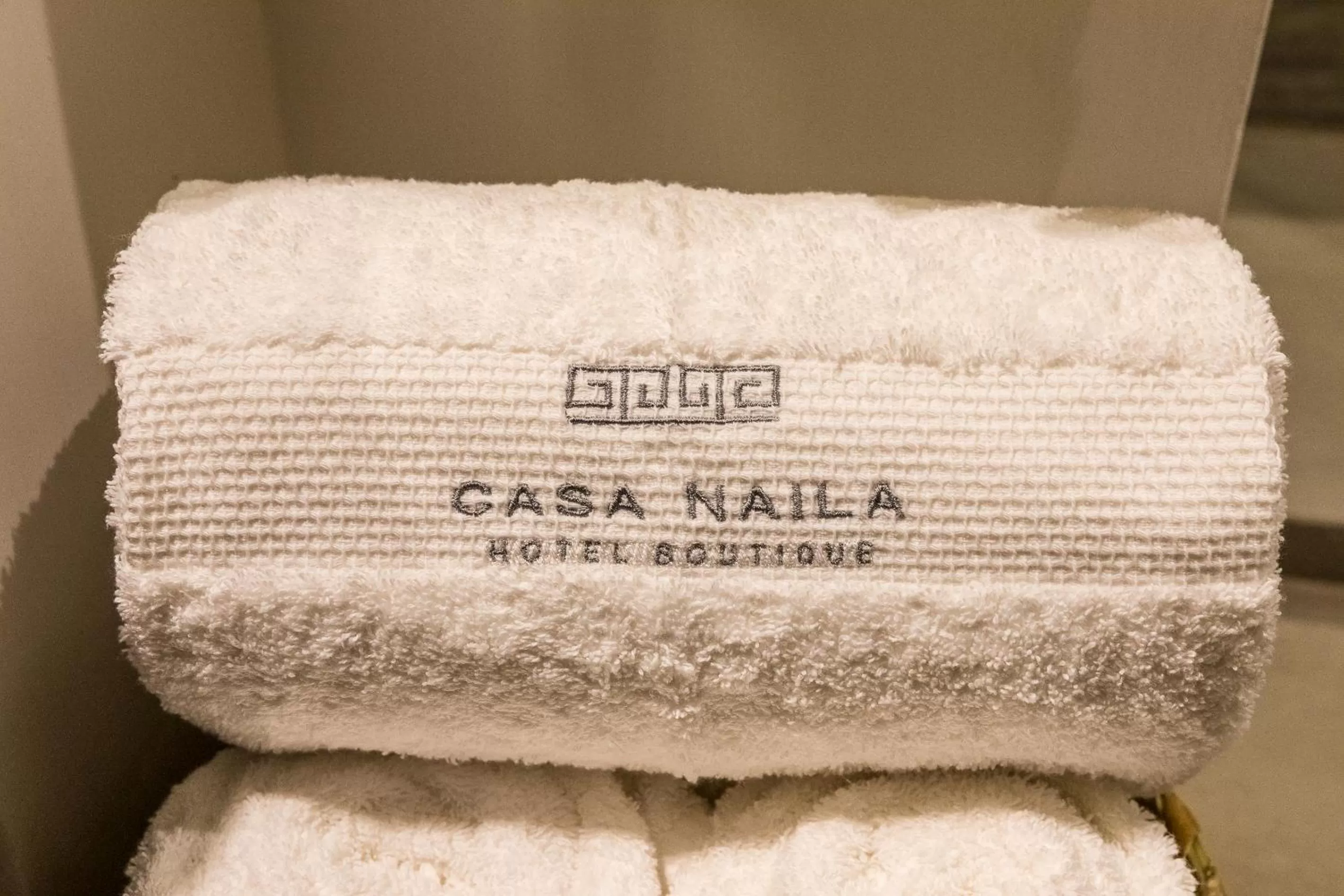 Text overlay in Casa Naila Hotel Boutique