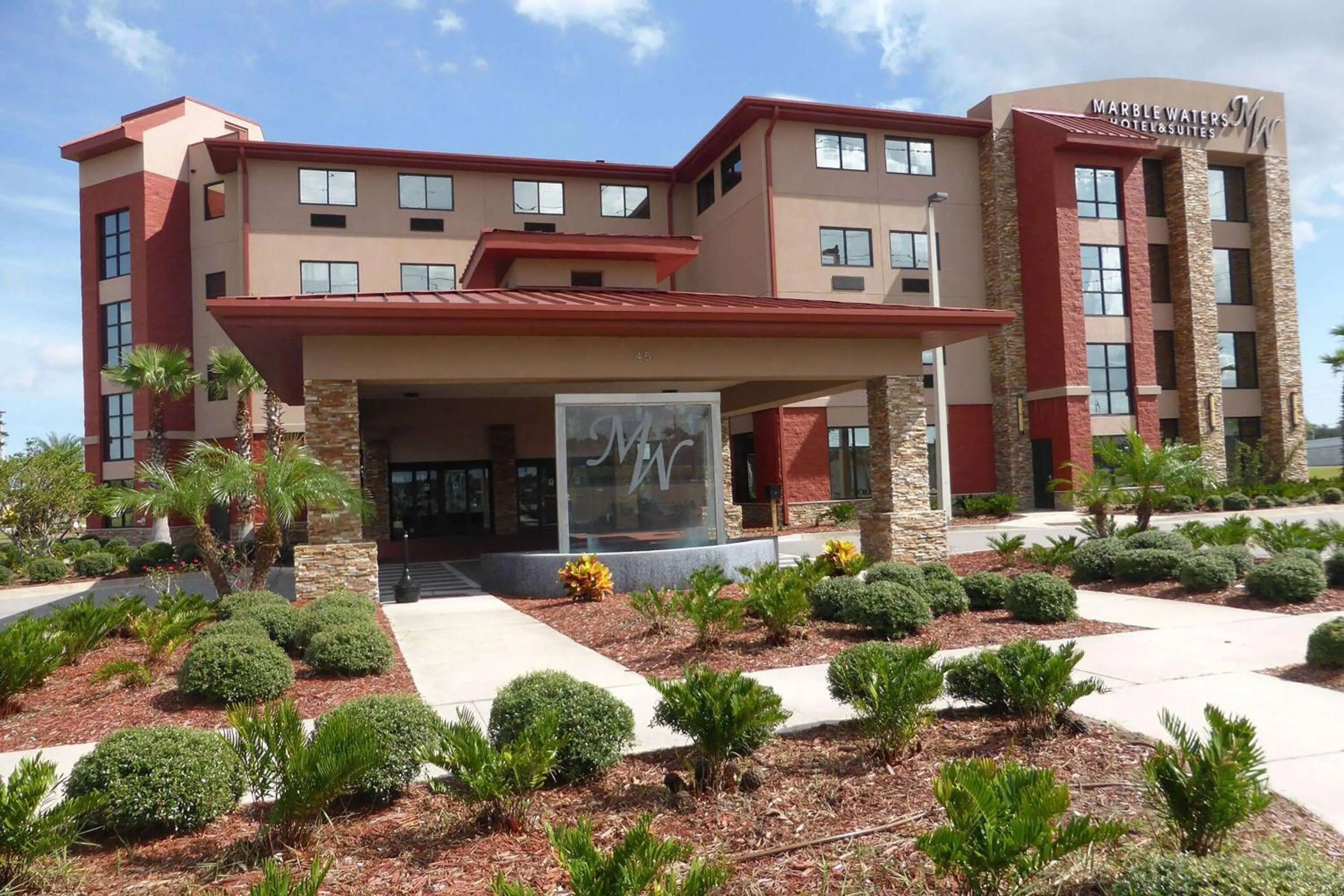 Property building in Marble Waters Hotel & Suites, Trademark by Wyndham