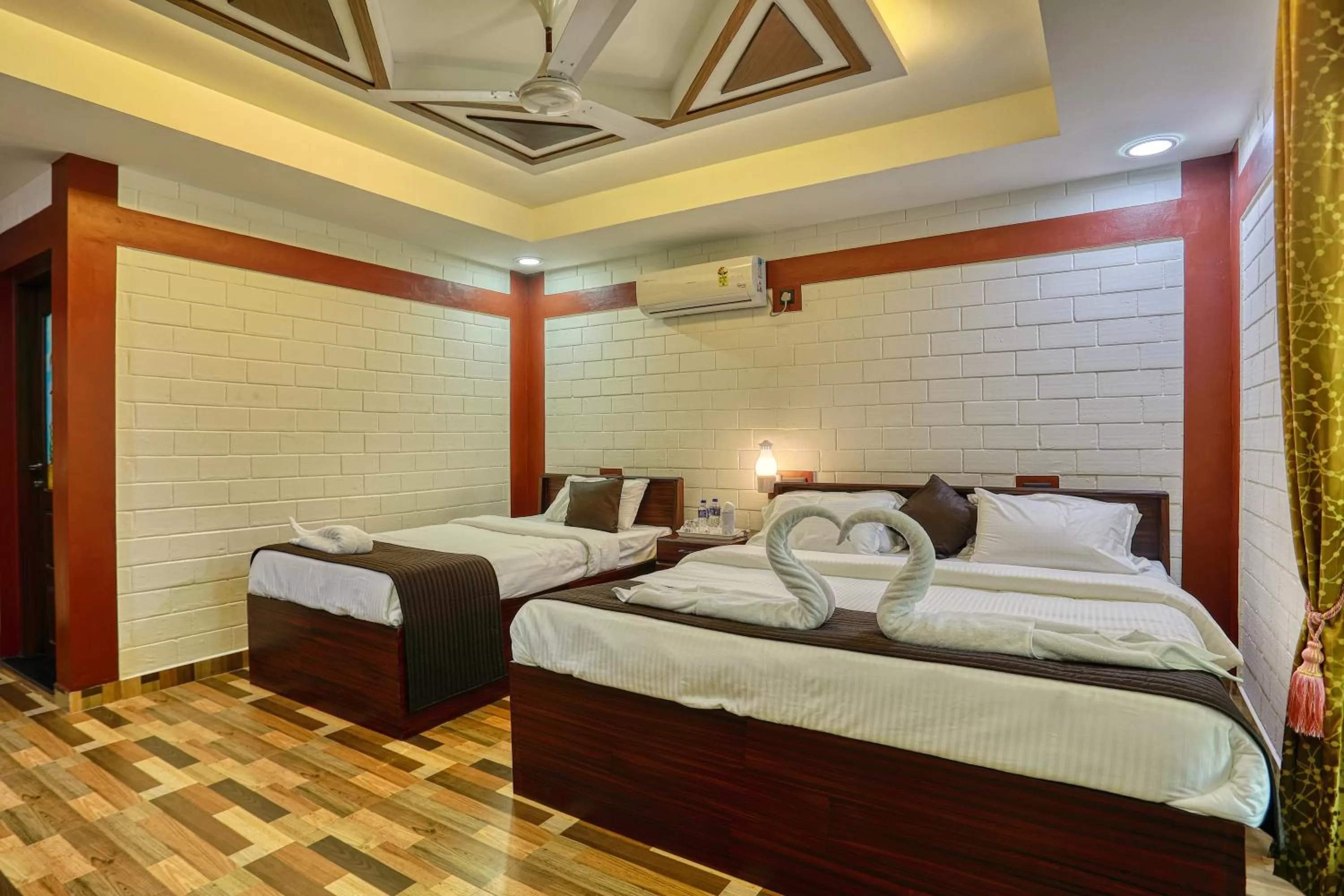 Bed in LEISURE VALLEY BEACH RESORT