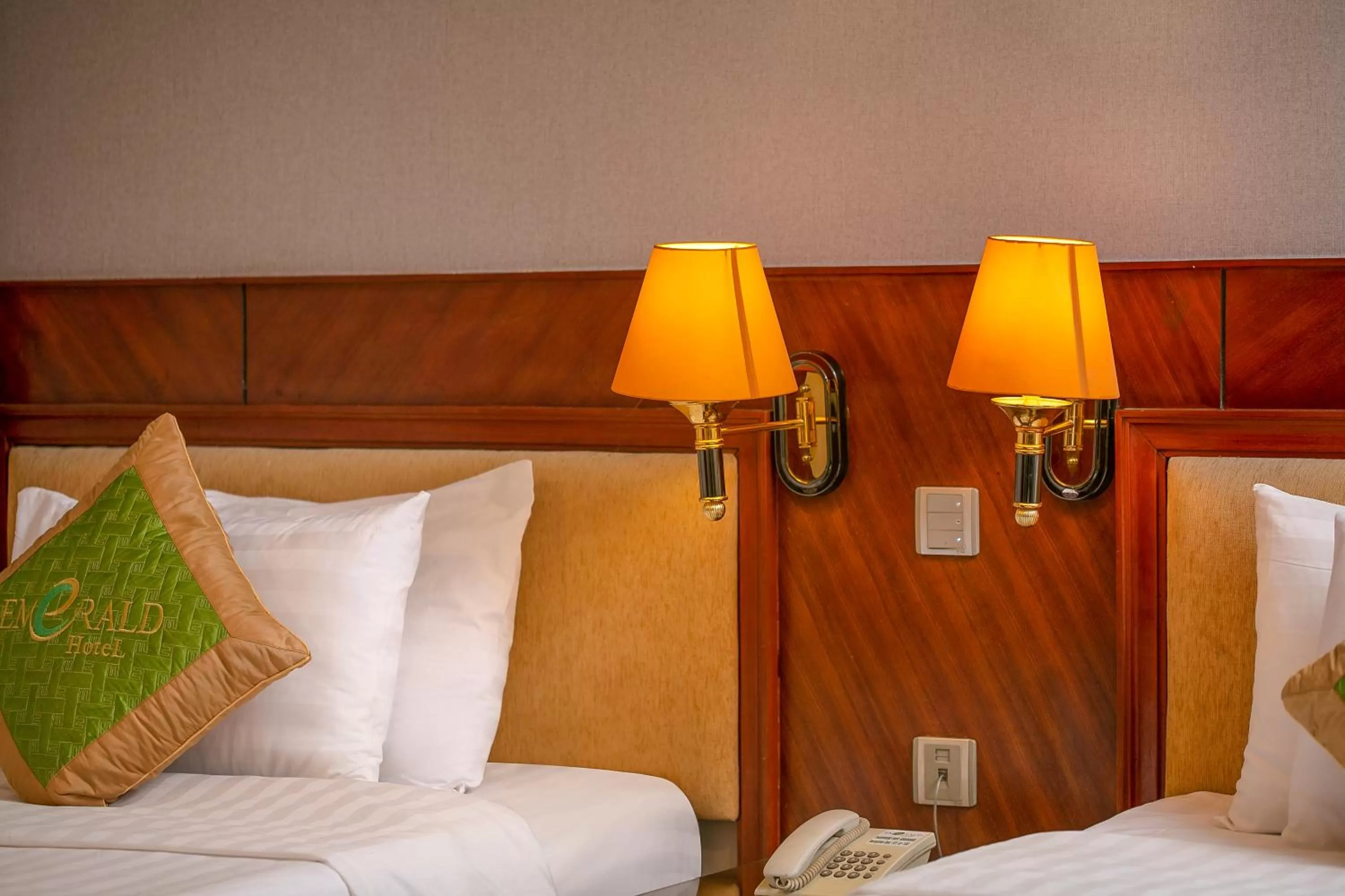 Bed in Emerald Boutique Hotel