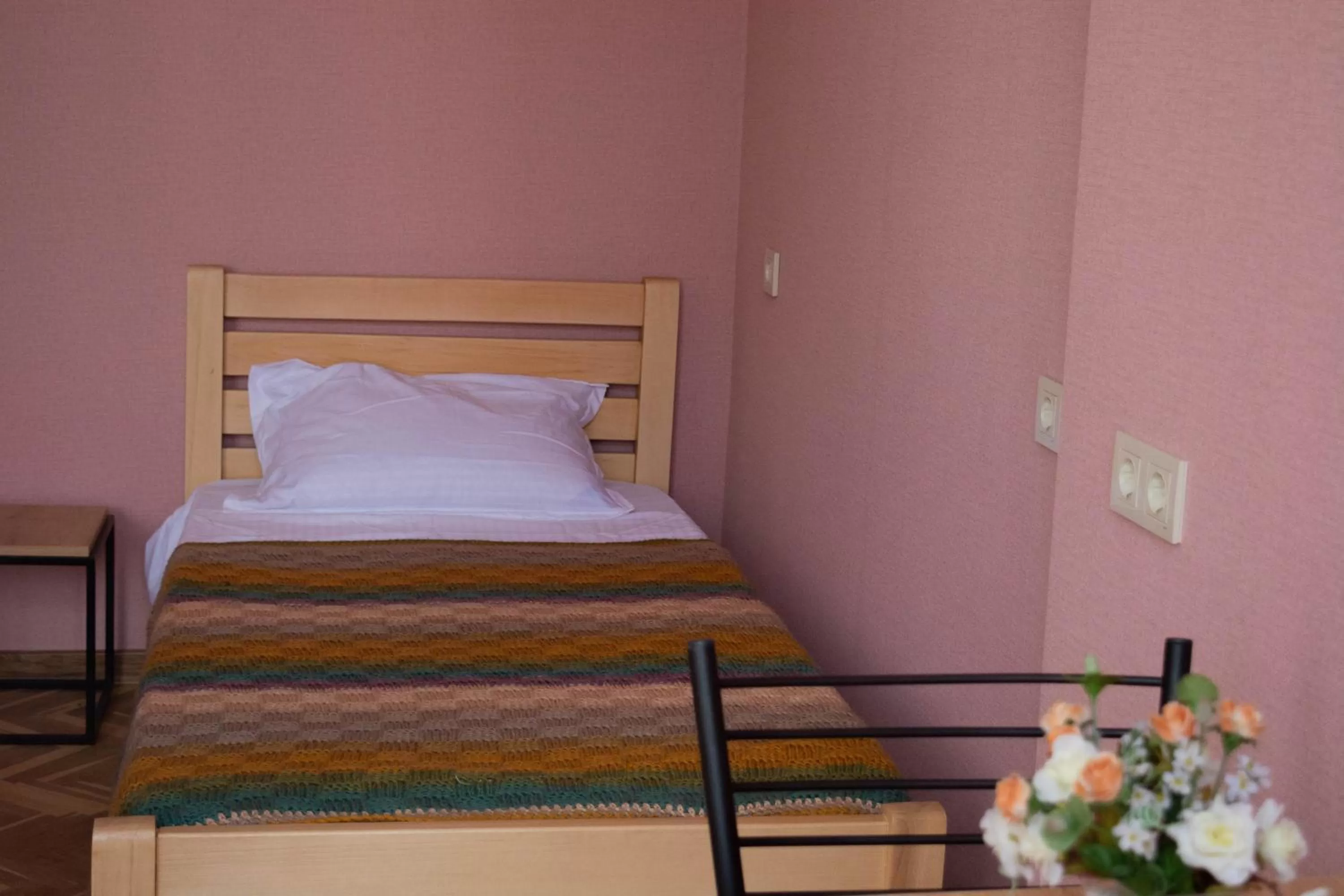 Bed in Sunflower Hotel