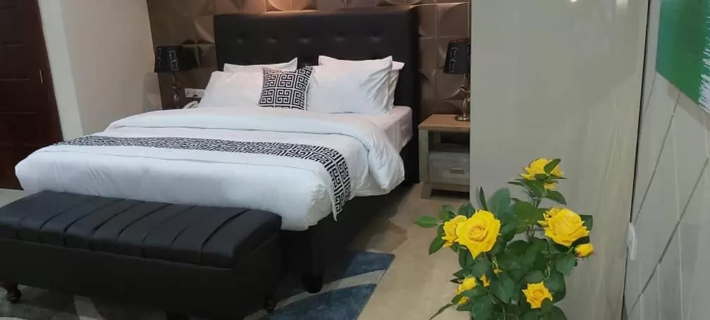 Bed in Lantana Hotel