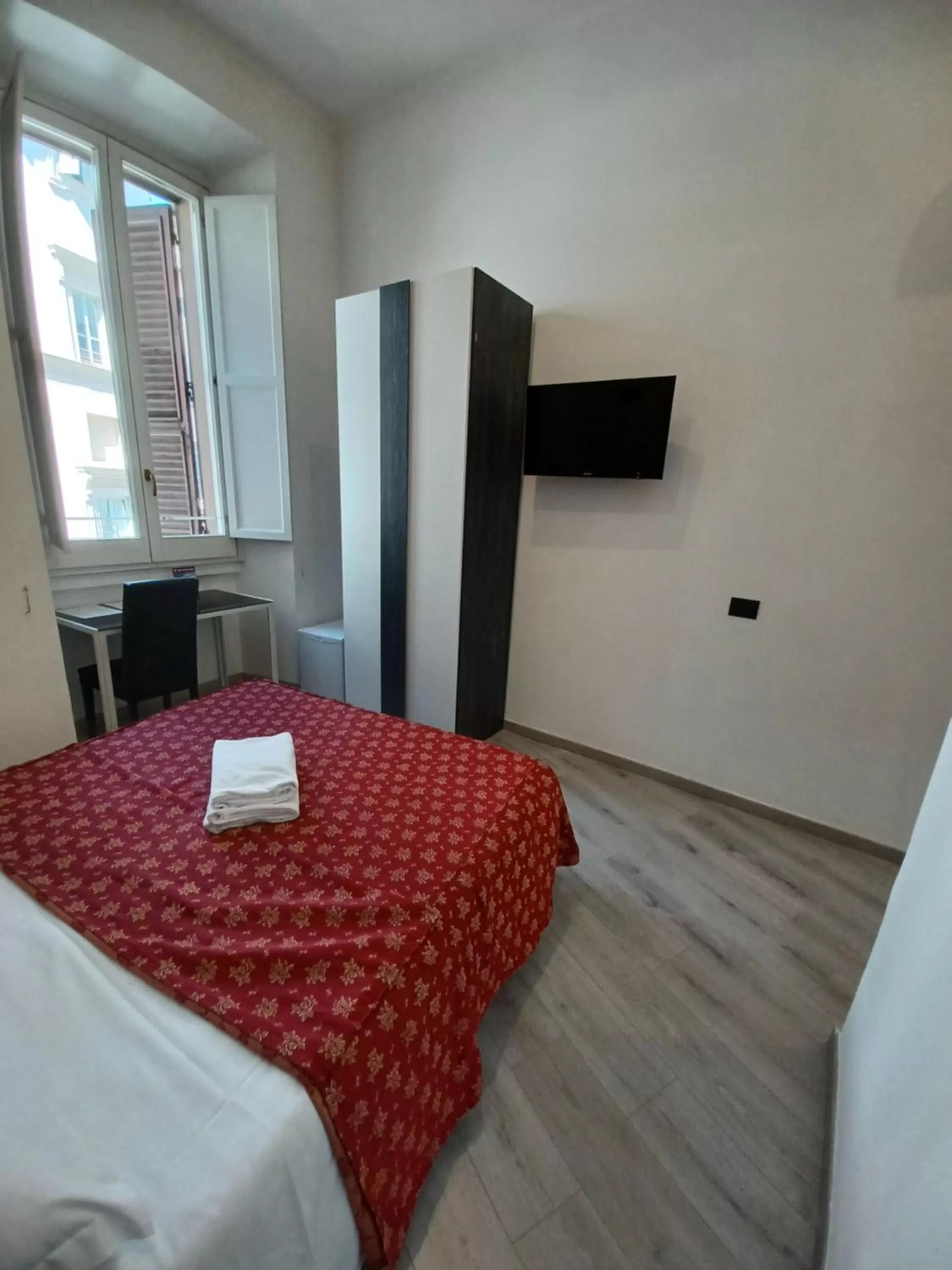 Bed in Hotel Mimosa Pantheon