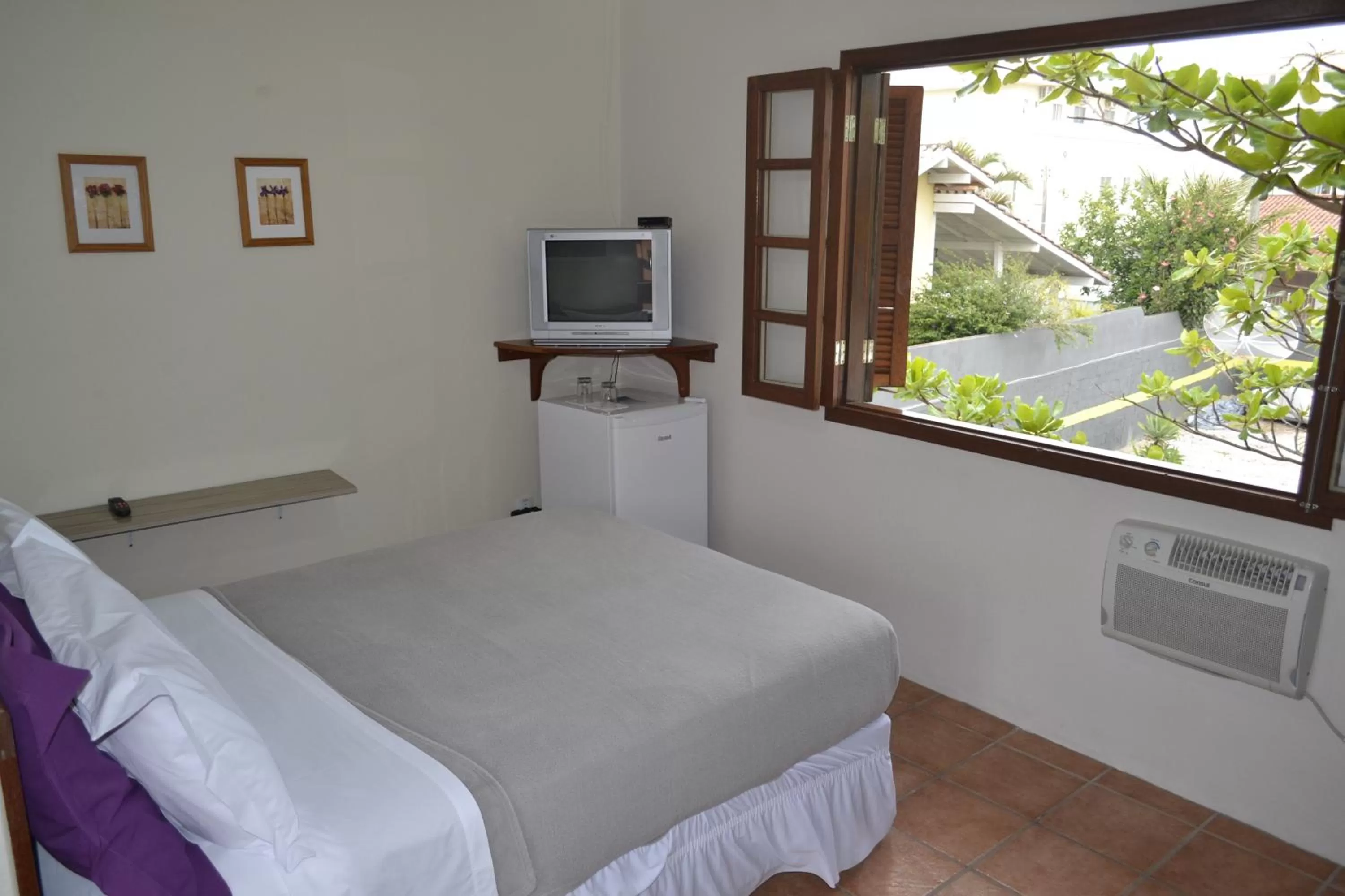 Bed in Pousada Água da Fonte