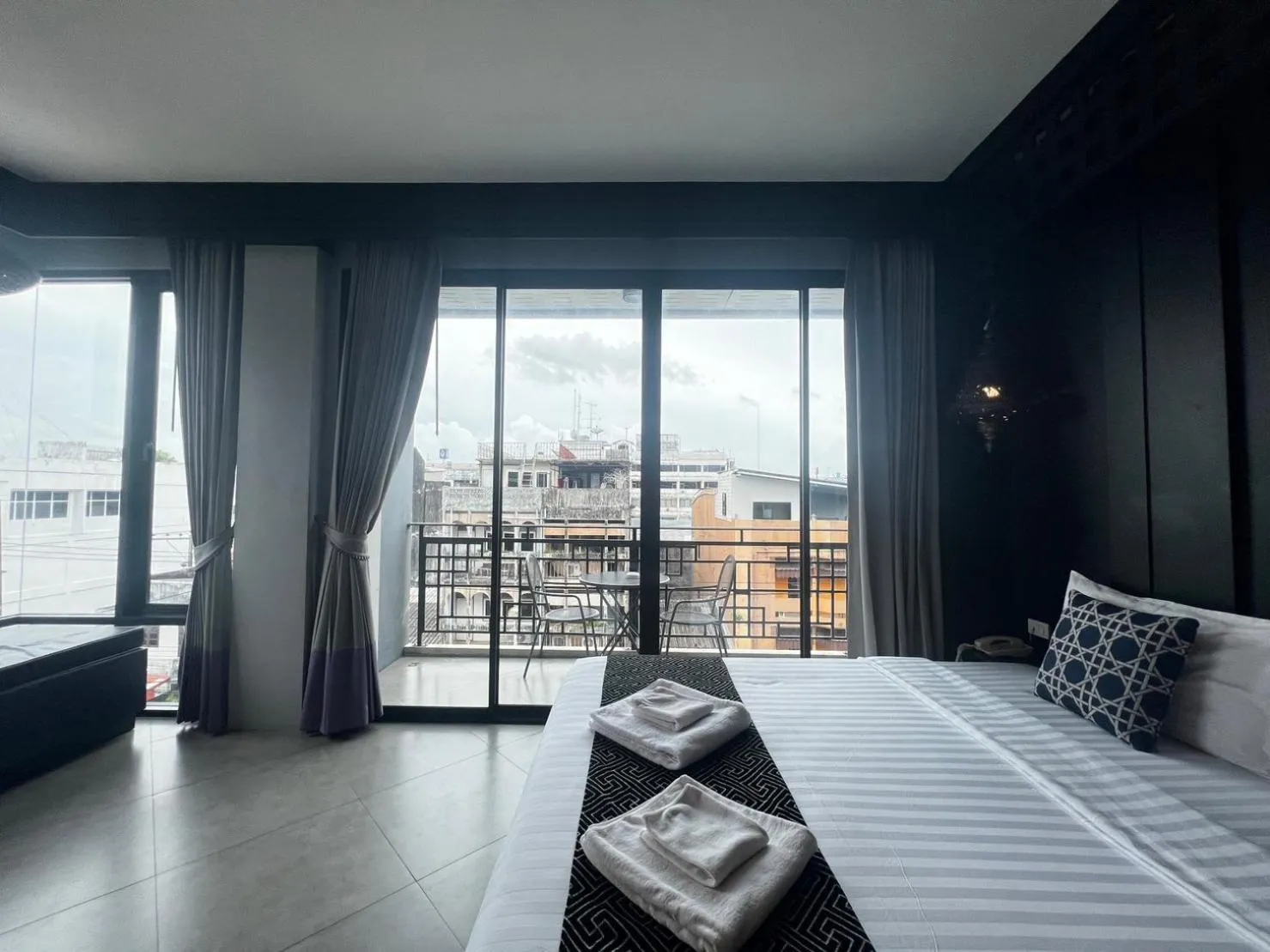 Bed in Srisawara Casa Hotel