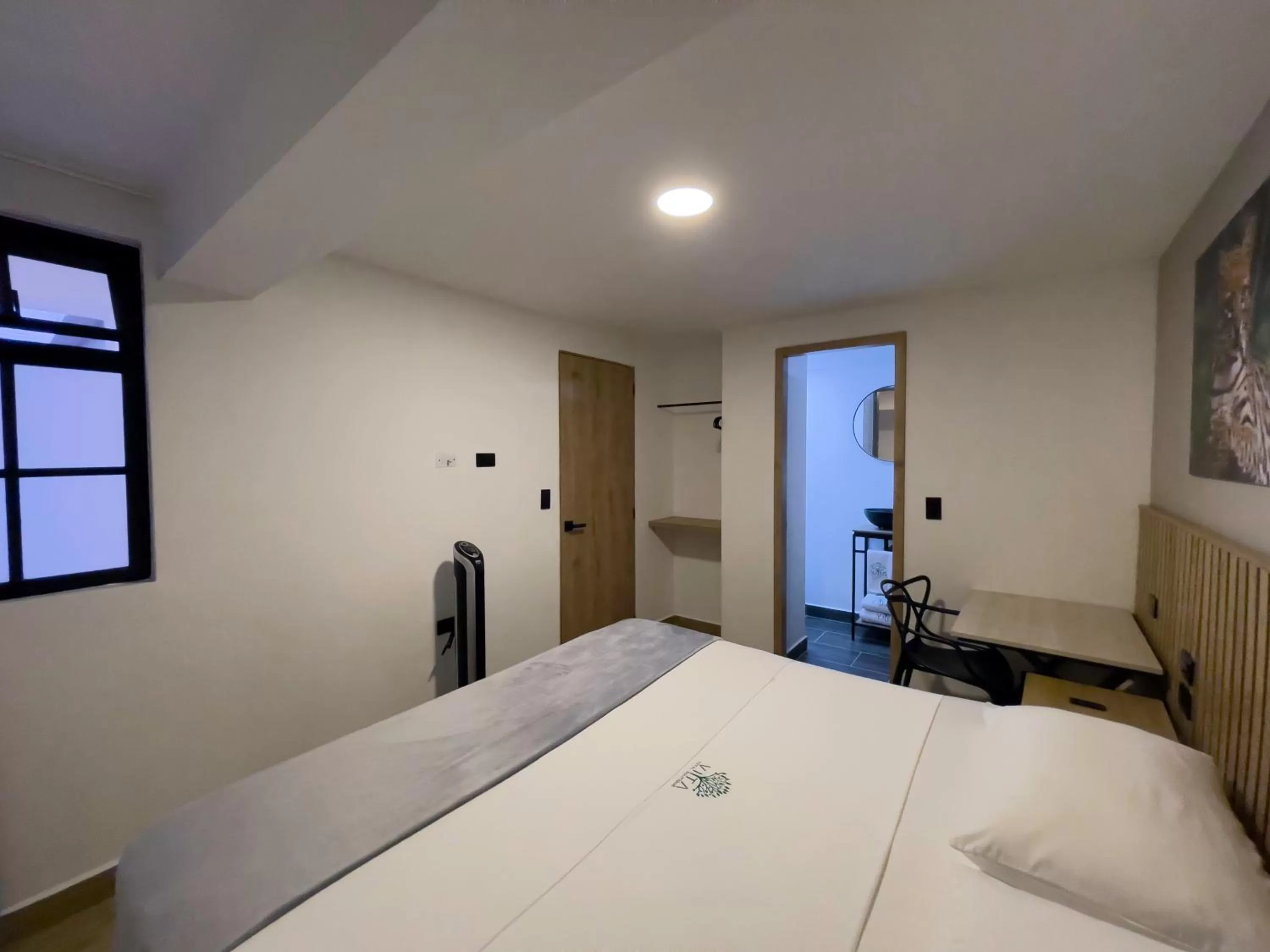 Bed in Vita Hotel Boutique