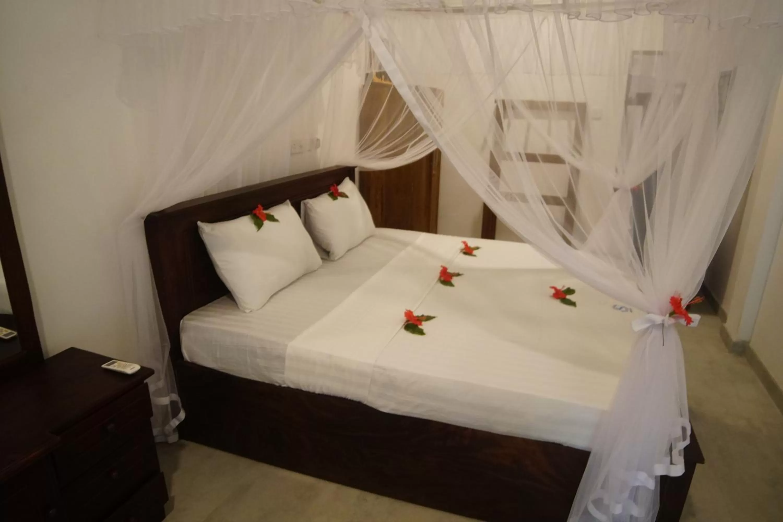 Bed in Turtle Bay Beach Resort