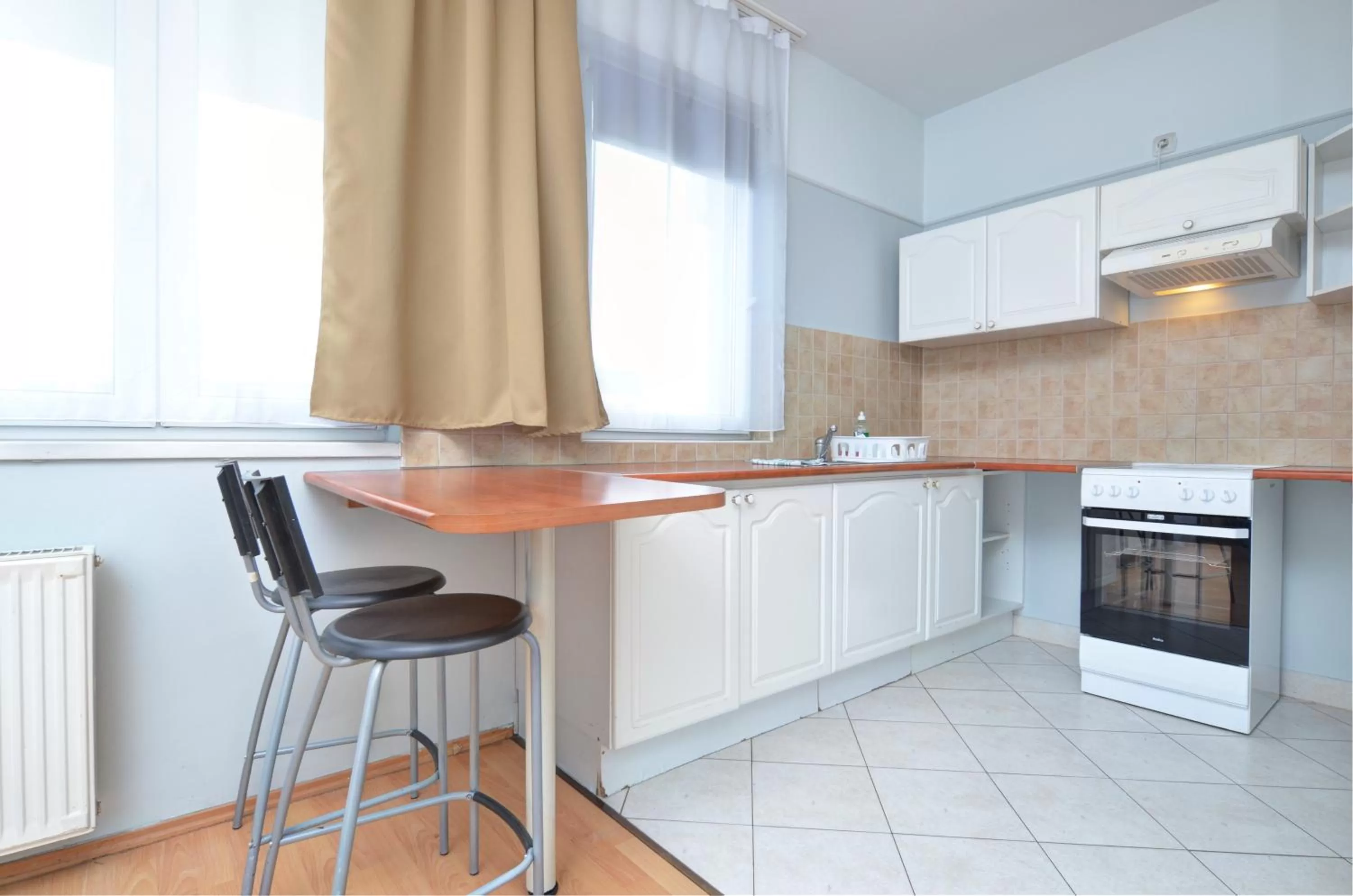 Kitchen or kitchenette in Agape Apartments