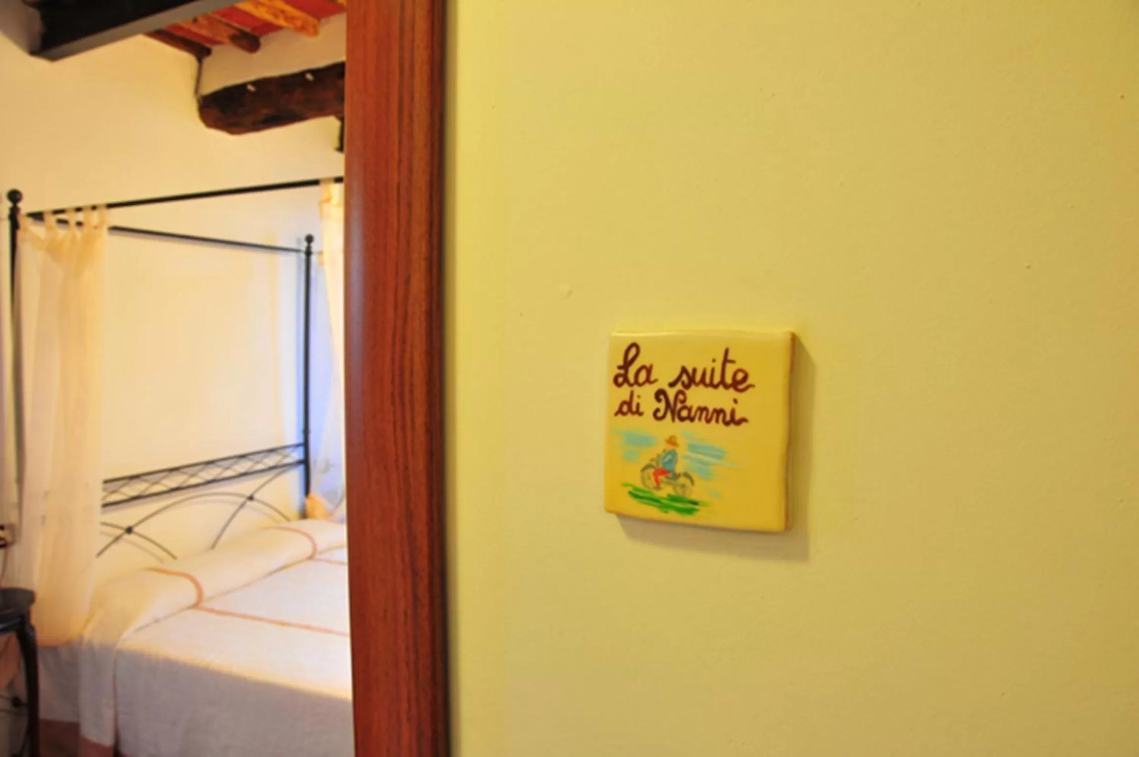 Decorative detail, Bed in B&B Il Casale di Nanni