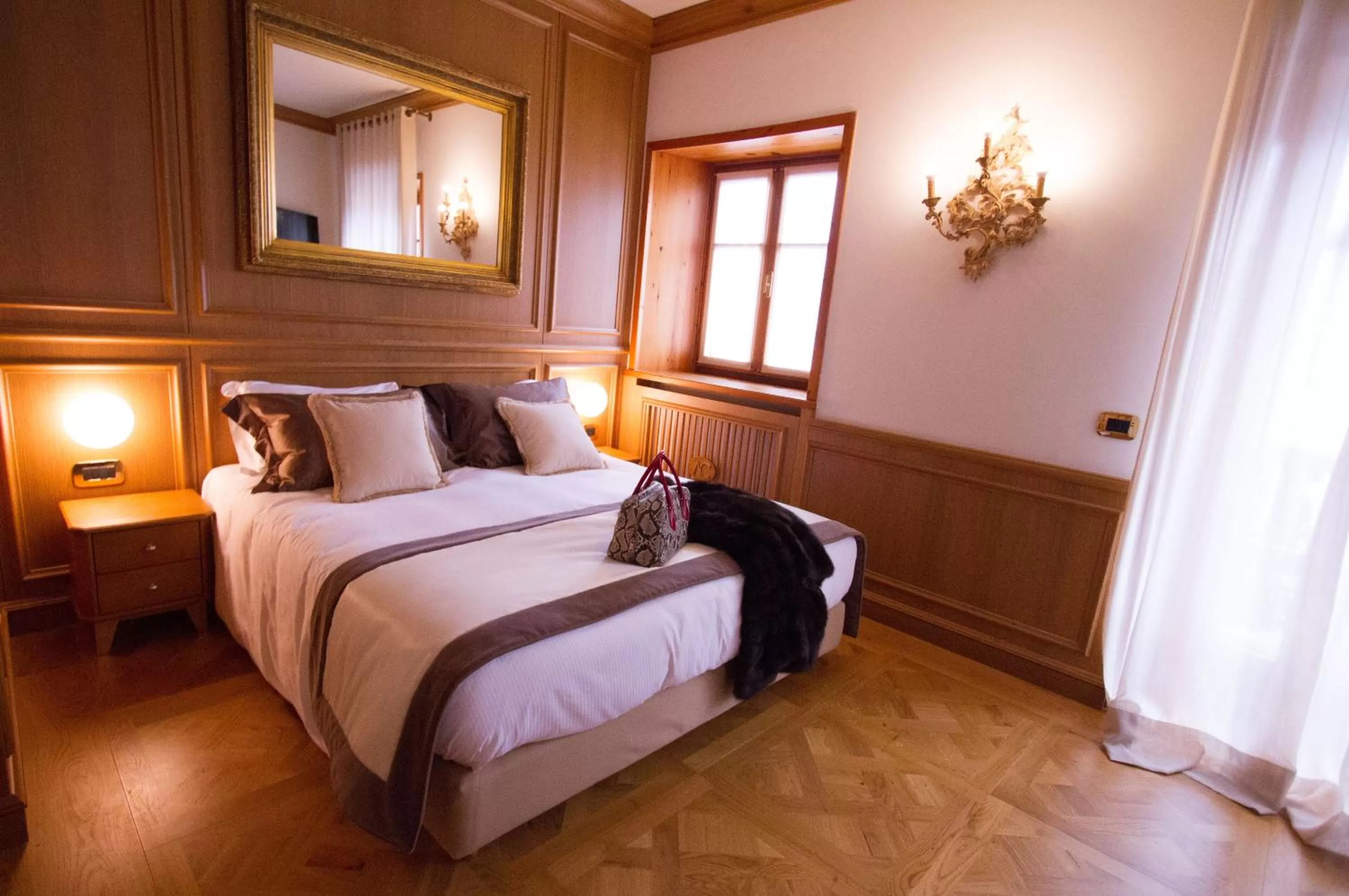 Bed in Ambra Cortina Luxury&Fashion Hotel