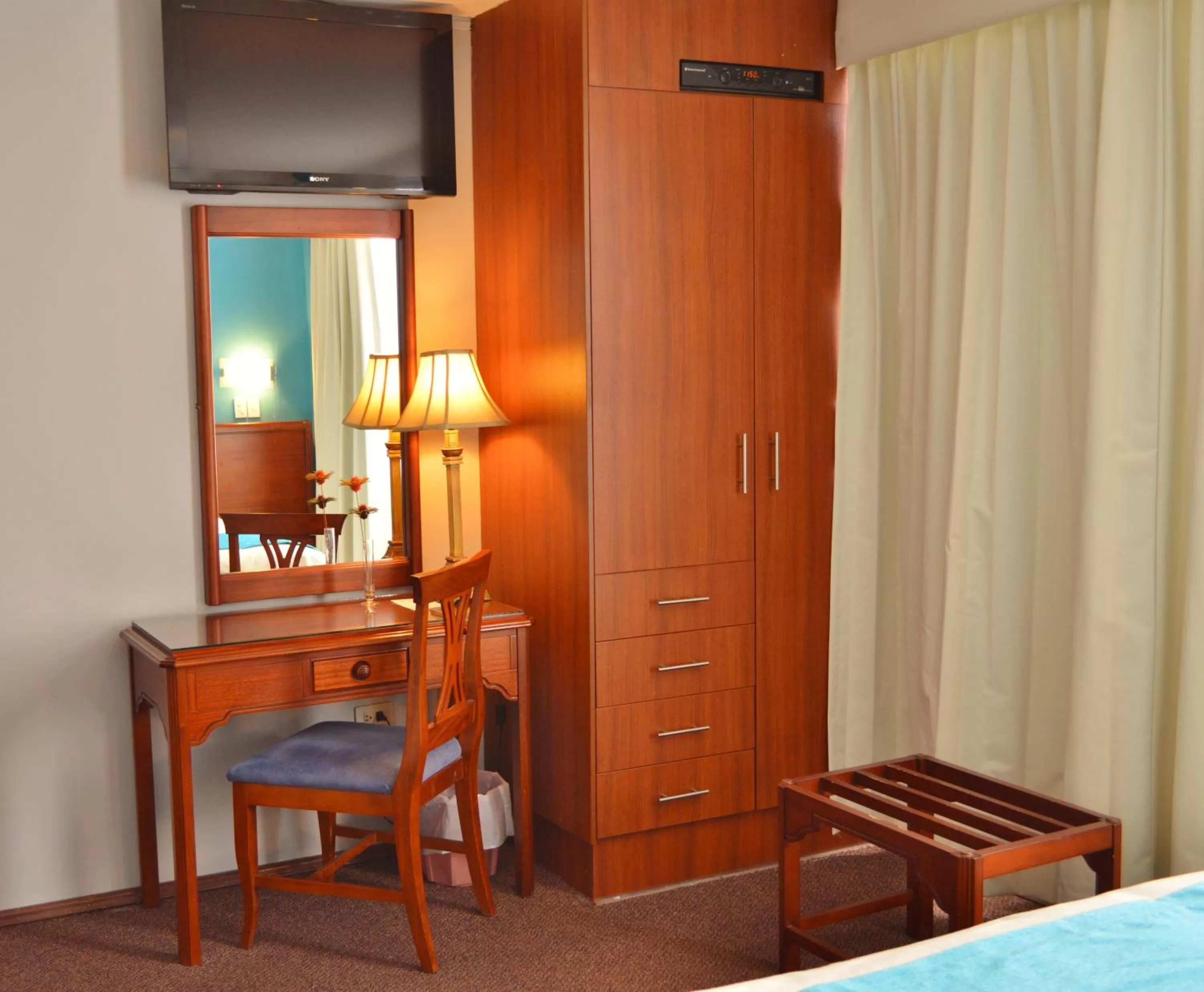 Decorative detail, TV/Entertainment Center in La Carolina Inn