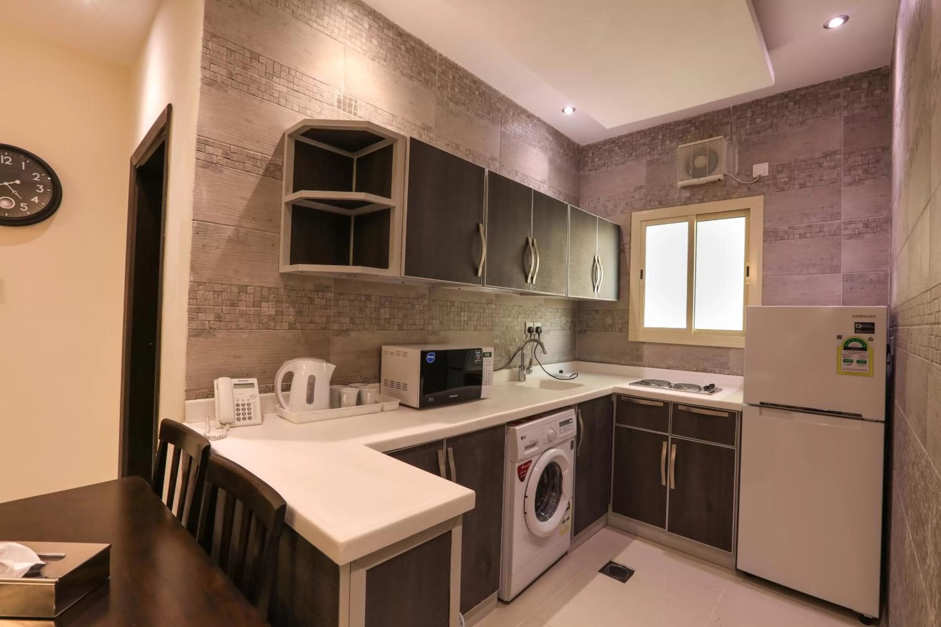 Kitchen/Kitchenette in Al Itqan Apart-hotel