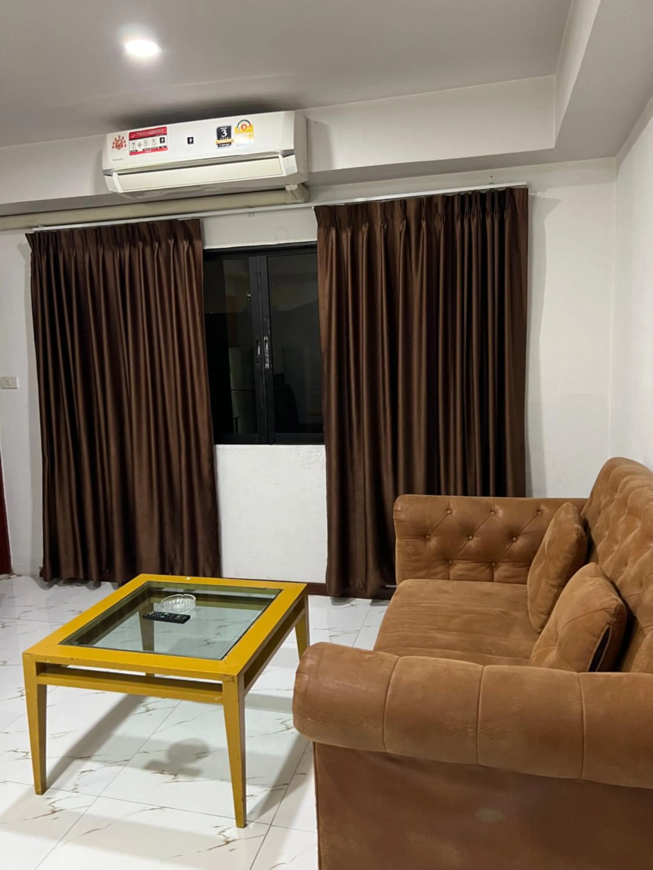 Living room in Mall Suites Hotel