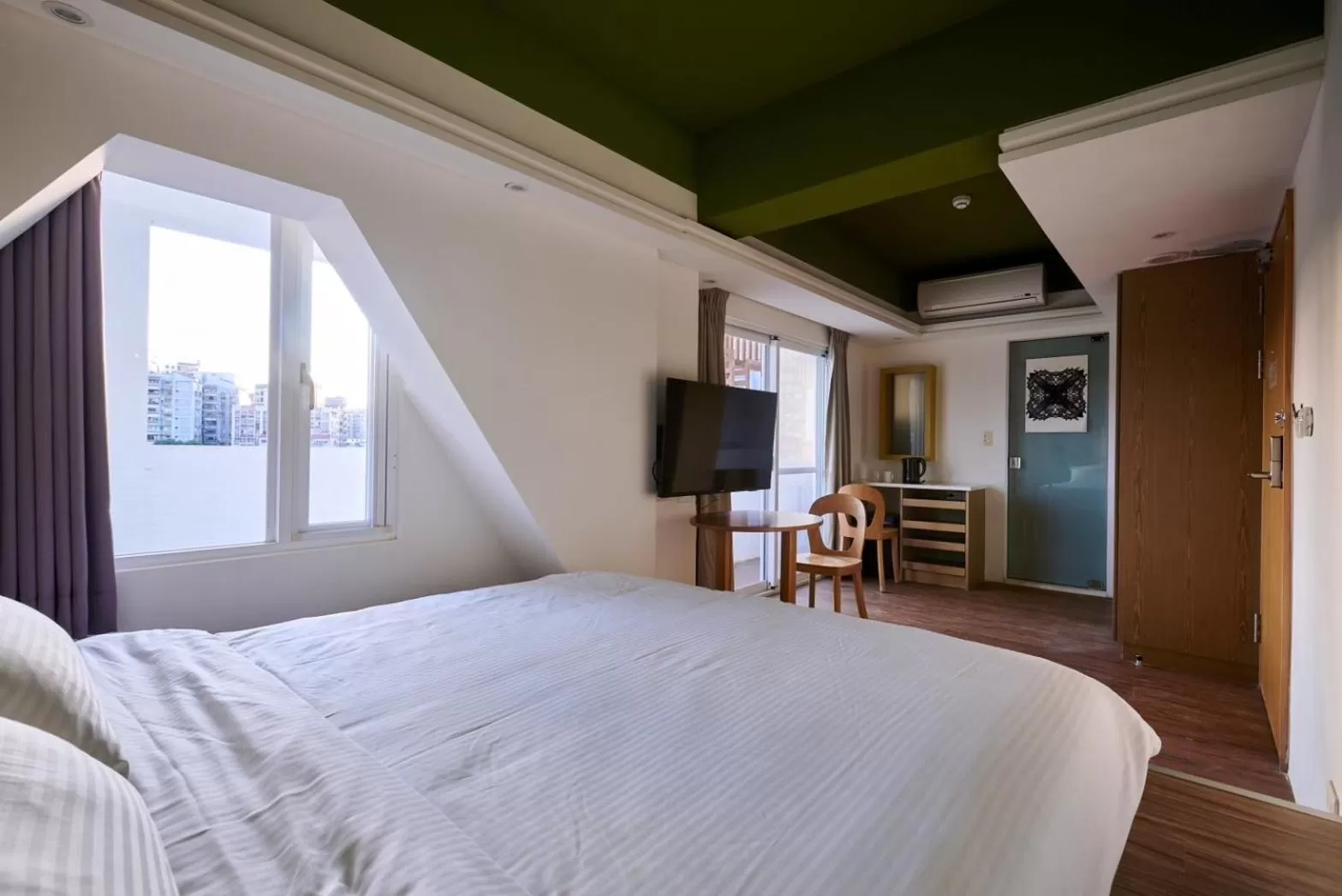 Bed in Papersun Hotel