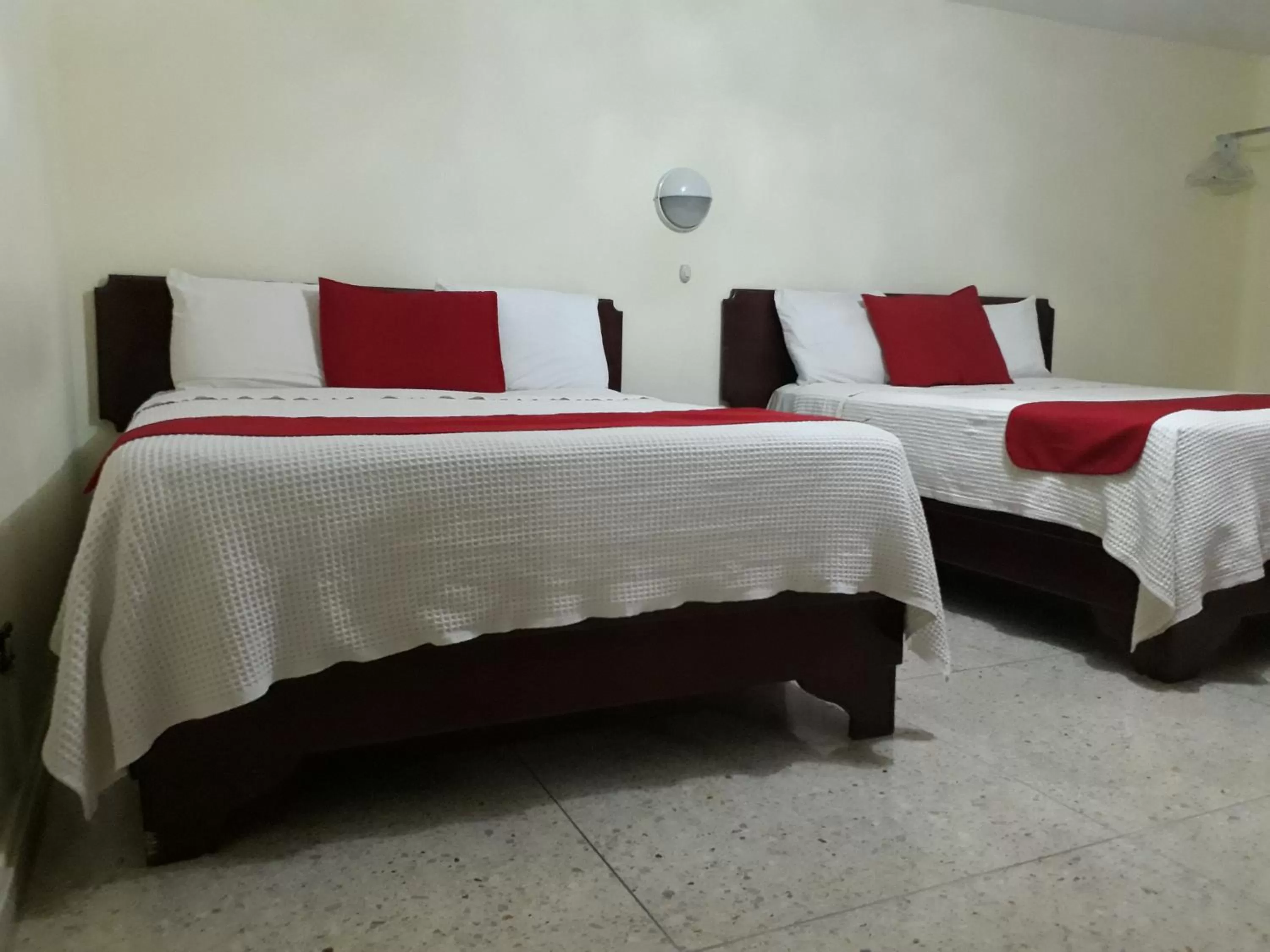 Bed in Hotel Olimpo