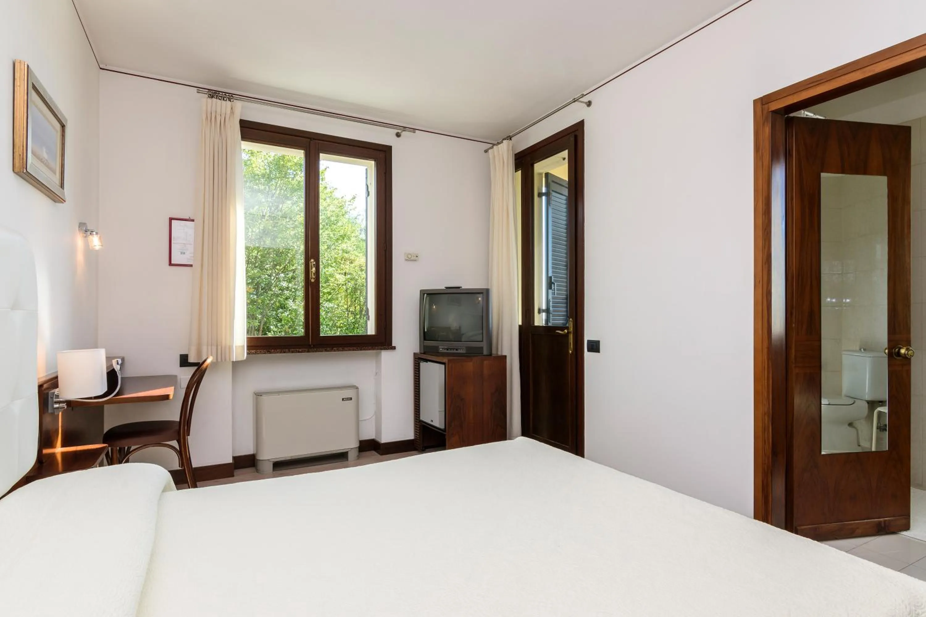 Bed in Hotel San Marco