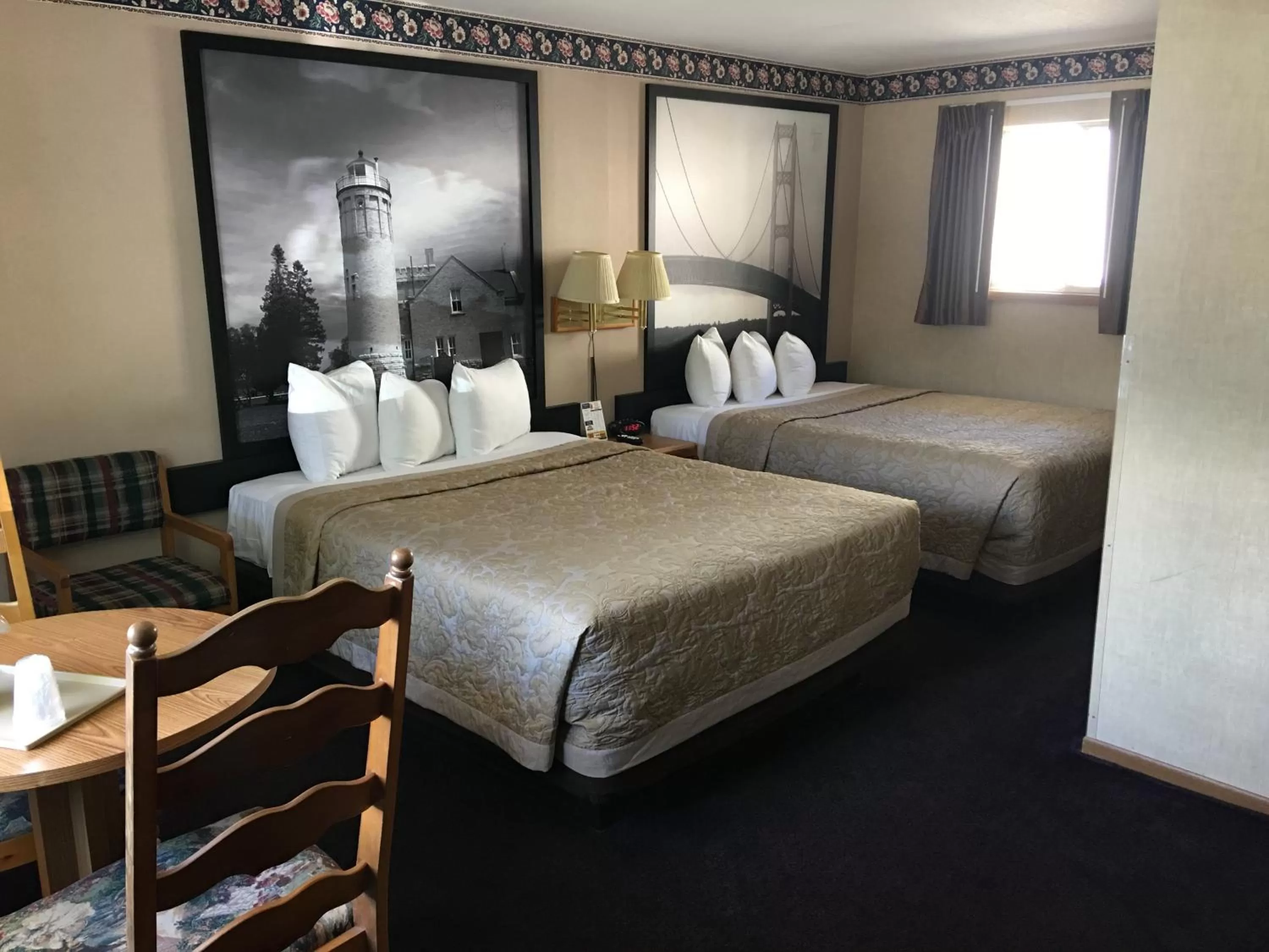 Photo of the whole room in Super 8 Beachfront by Wyndham Mackinaw City, MI