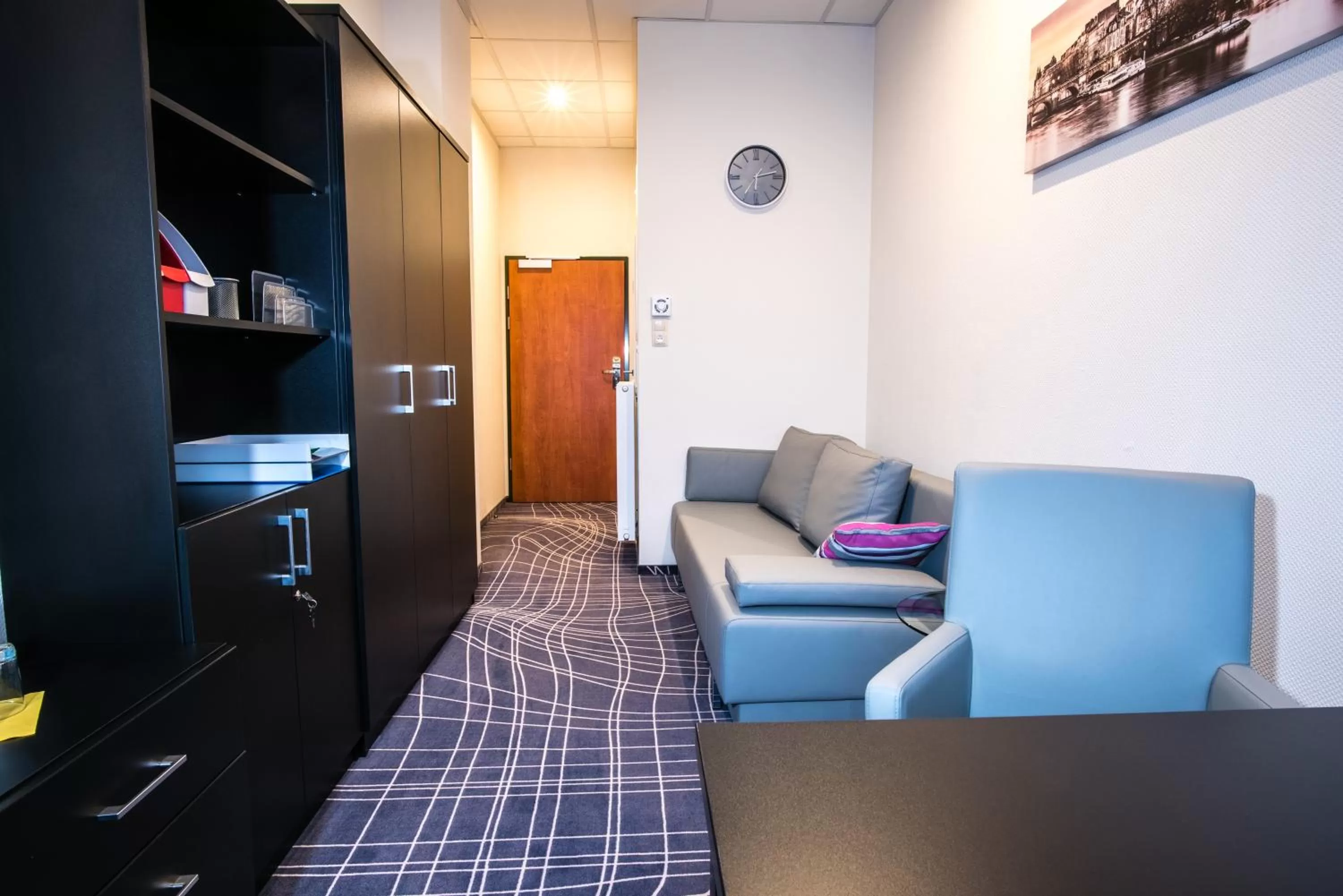 Living room in Sky Business Hotel