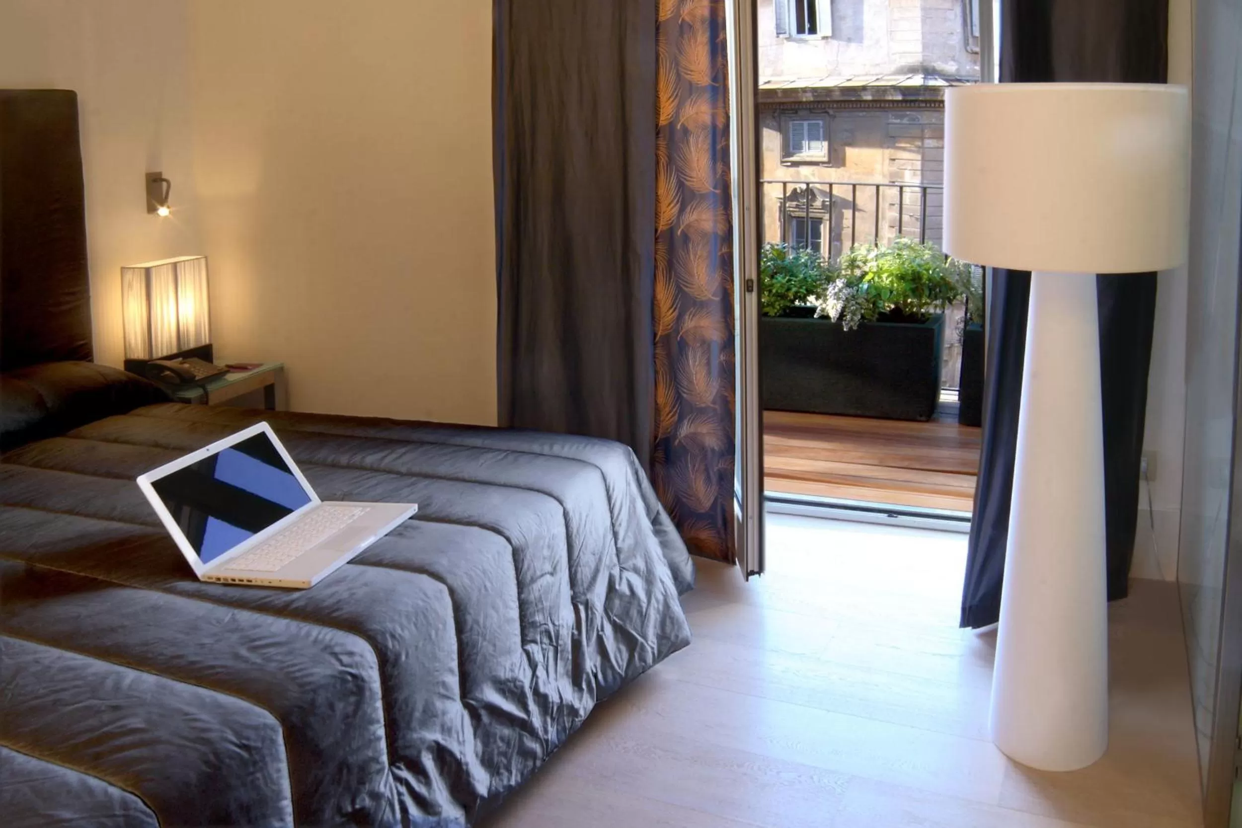 Bed in Hotel Adriano