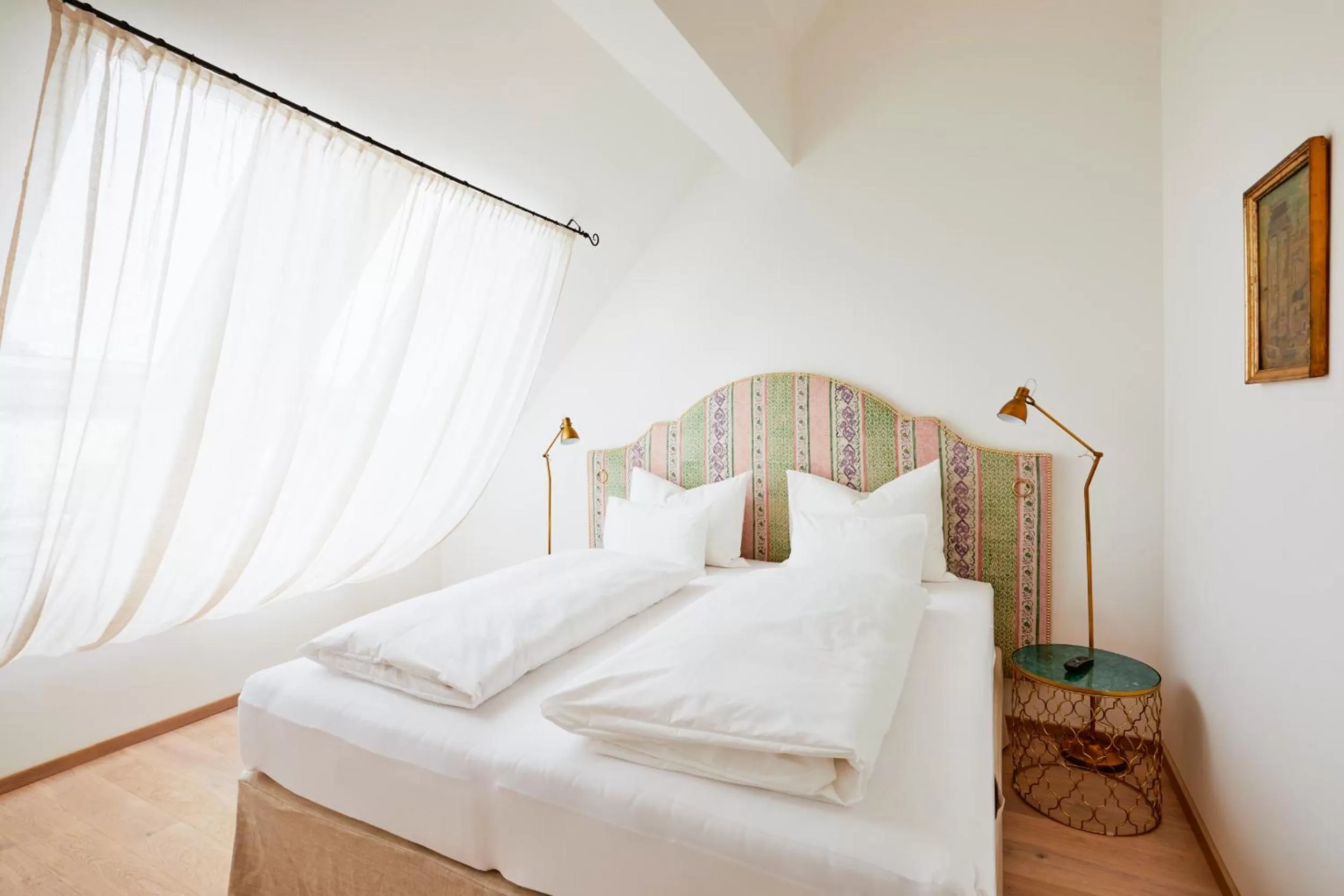 Photo of the whole room, Bed in Boutiquehotel Zum Goldenen Hirschen