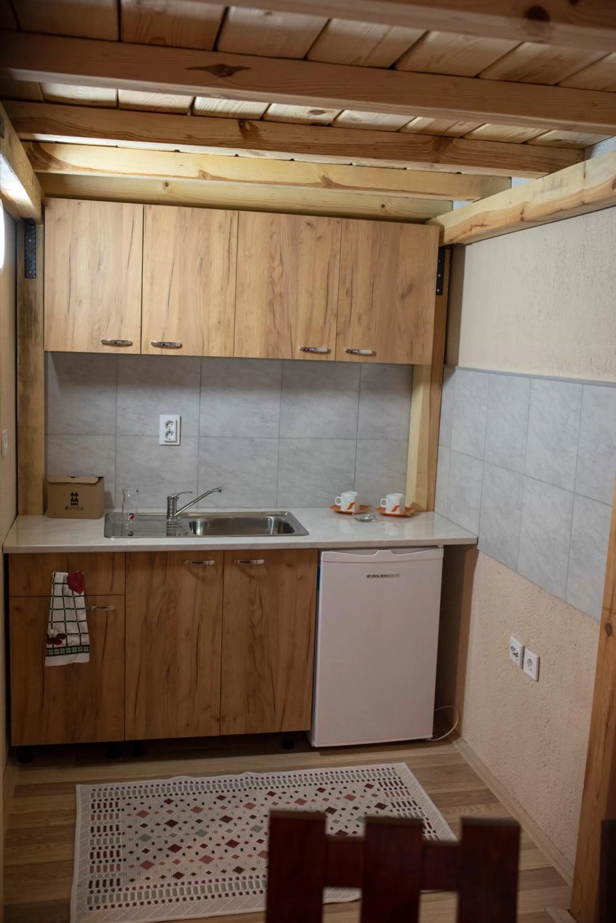 Kitchen/Kitchenette in DIONIS Rooms & Apartments