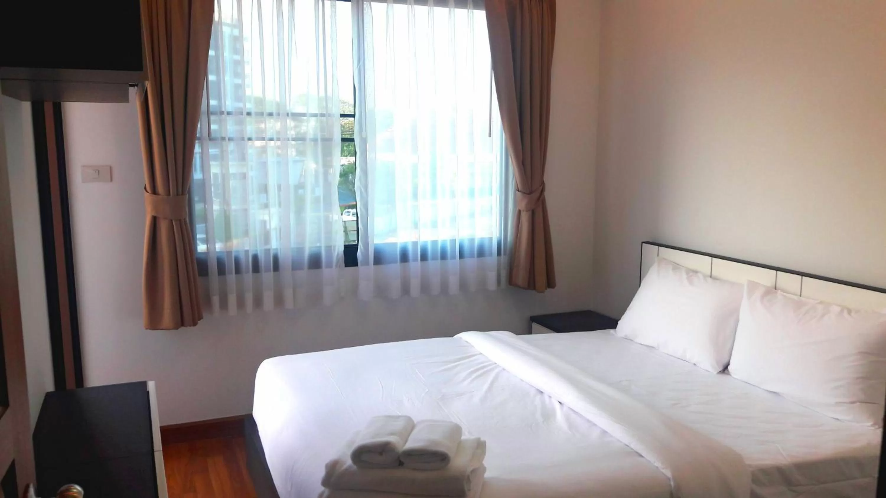 Bed in V-twin Donjan Service Apartment