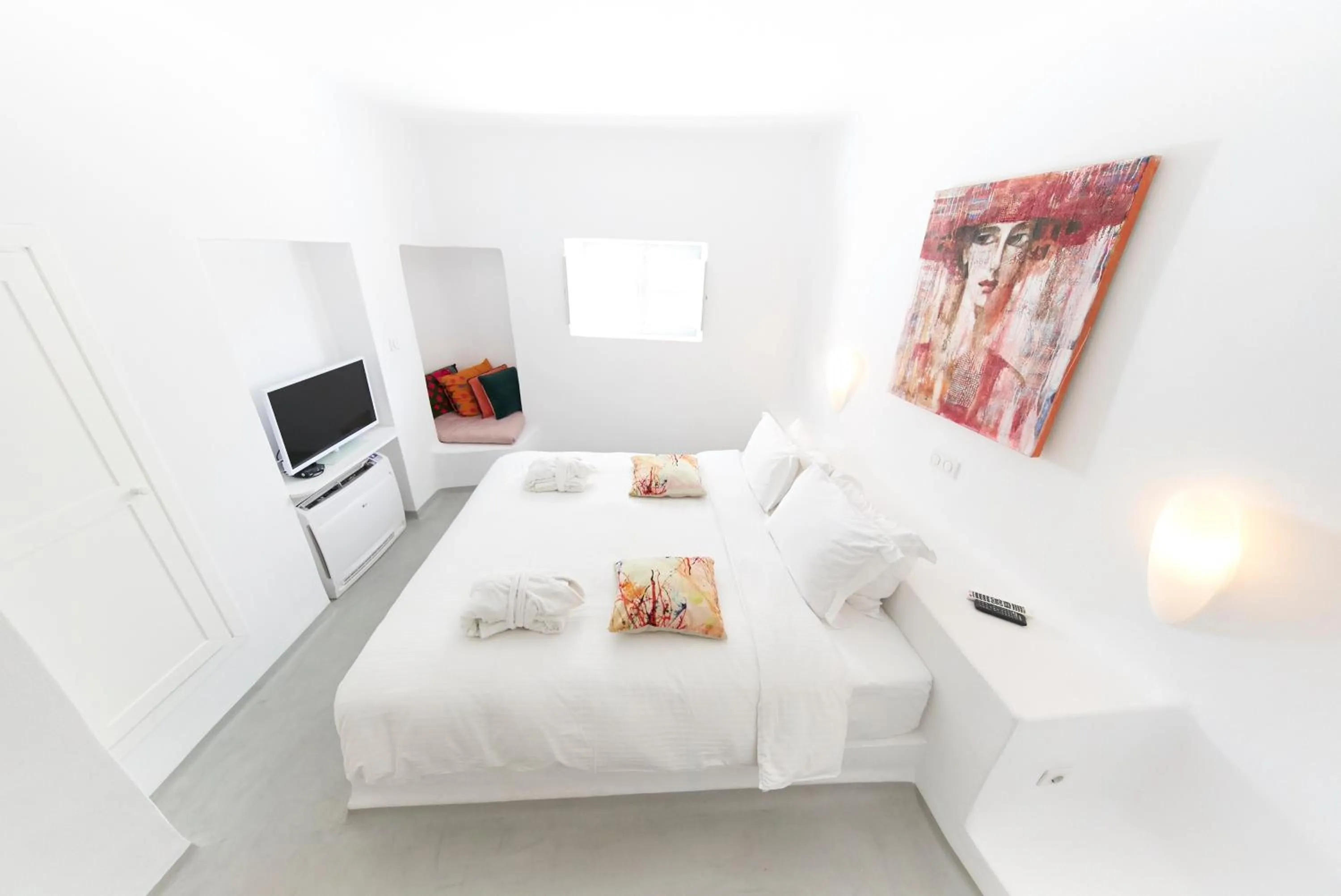 Bed in Trieris Villa & Suites