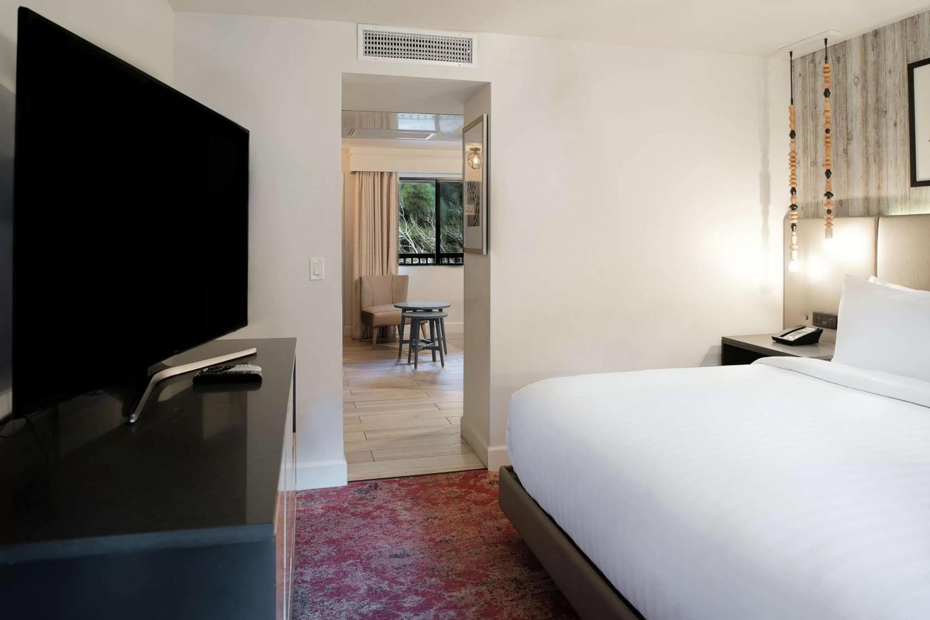 Bed in Cliffrose Springdale, Curio Collection By Hilton