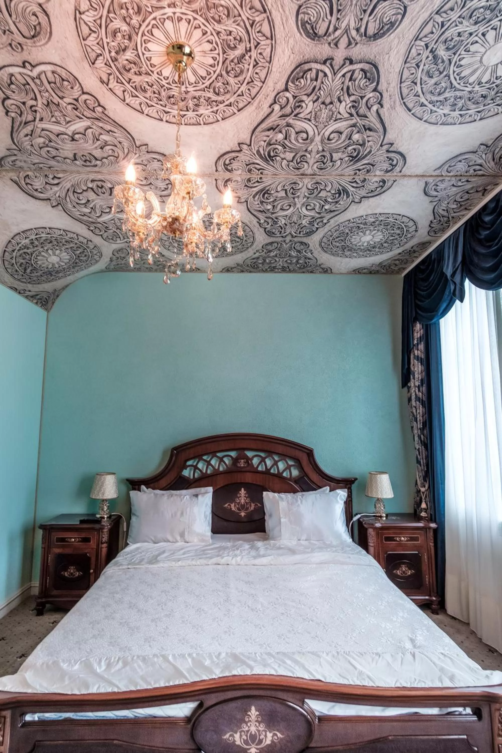 Bed in JMR Royal -Luxury Rooms & Private Sauna