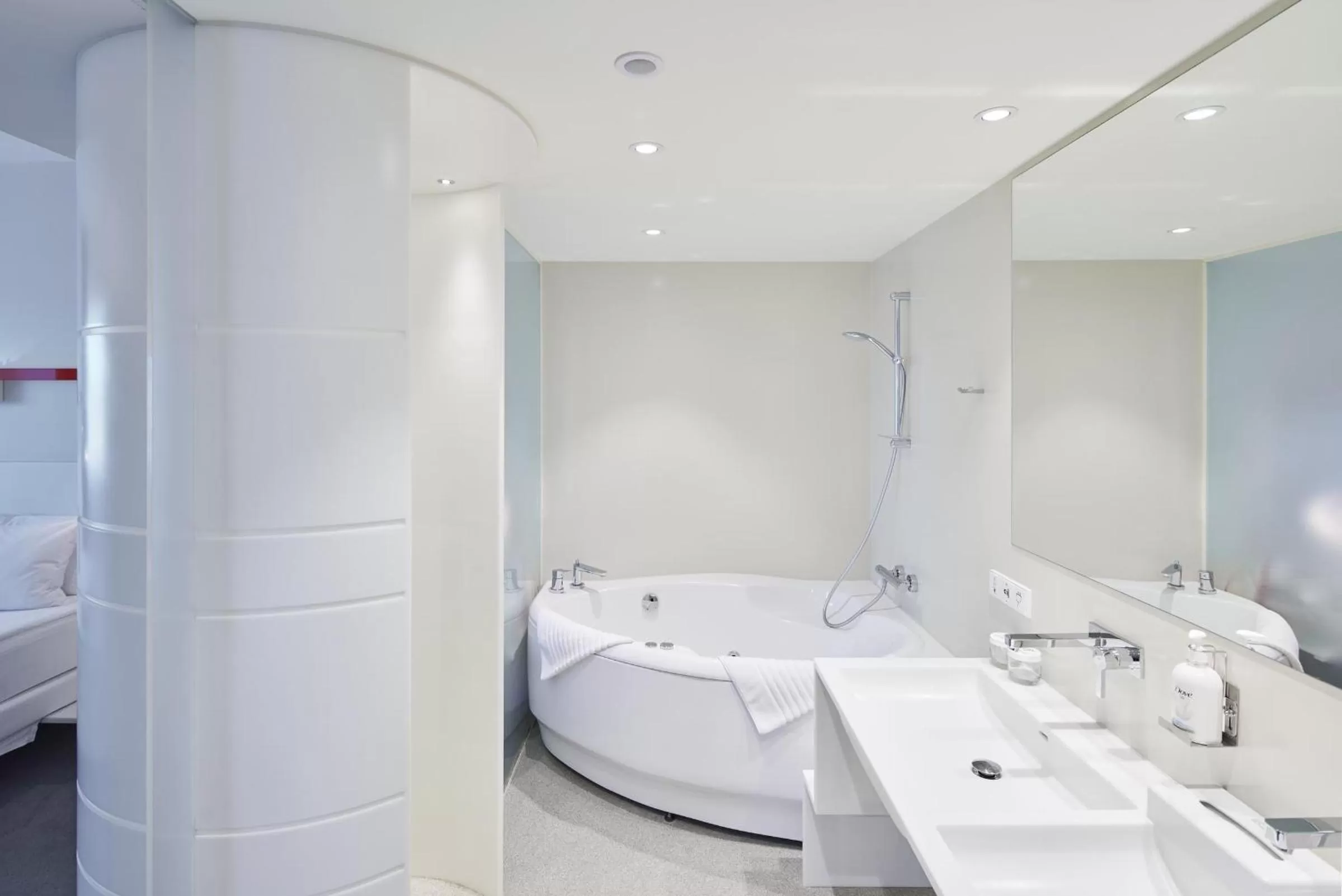 Bathroom, Bed in Holiday Inn Vilnius by IHG
