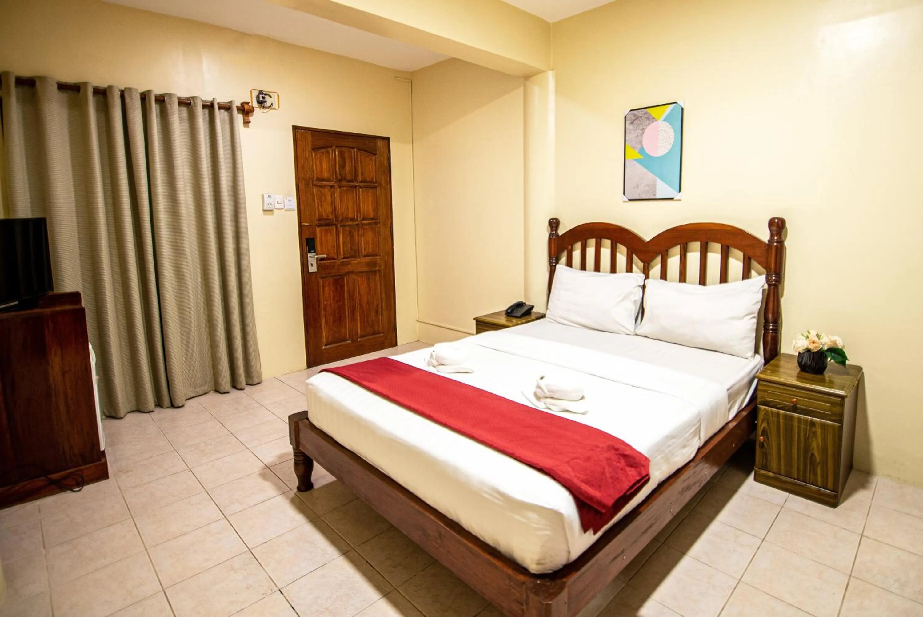 Bedroom in Kiwi Hotel