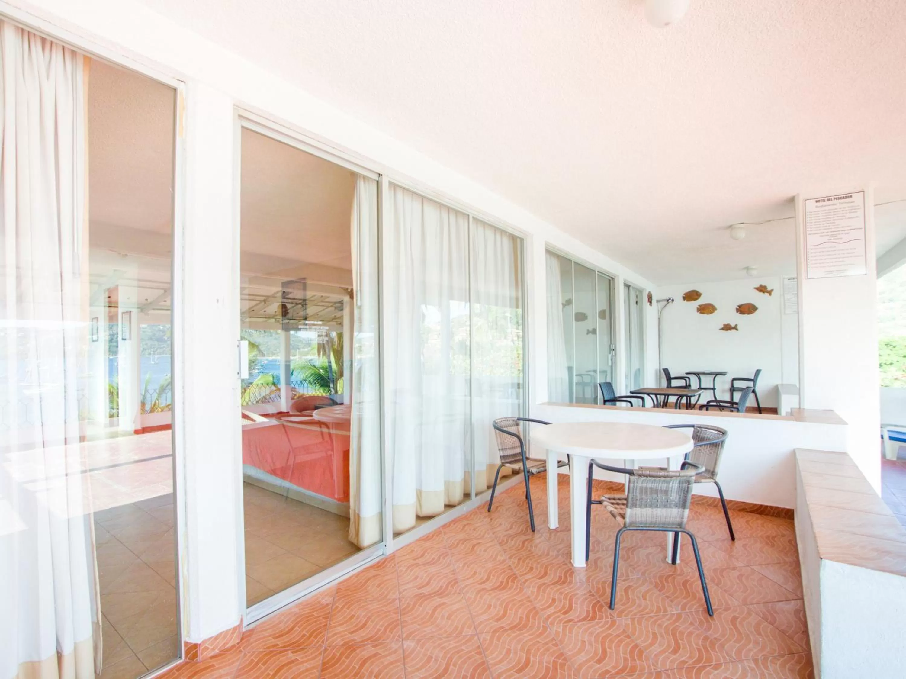 Living room, Dining Area in Hotel Del Pescador