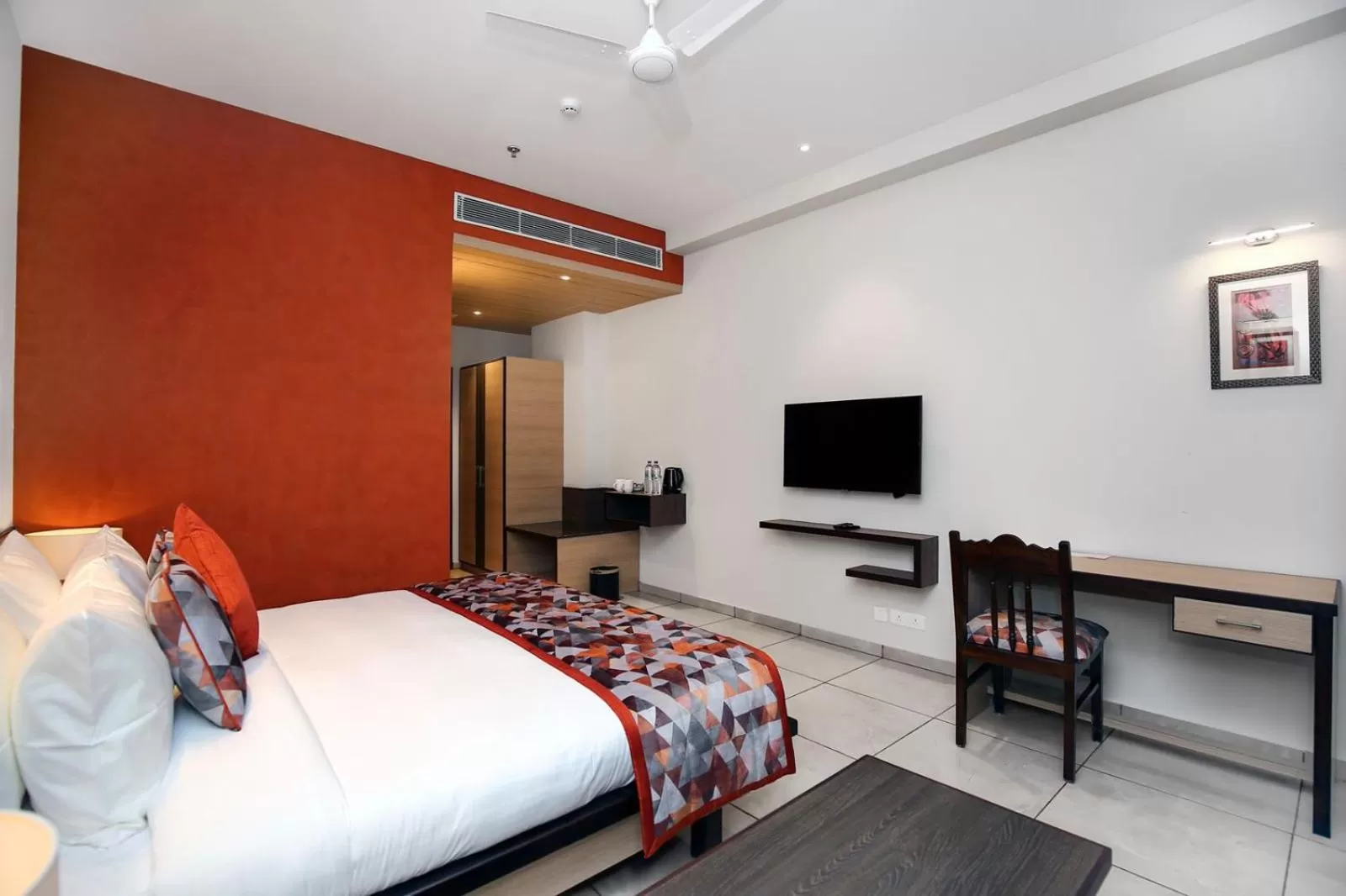 Bed, TV/Entertainment Center in The Zenith - A boutique hotel by Hot Millions