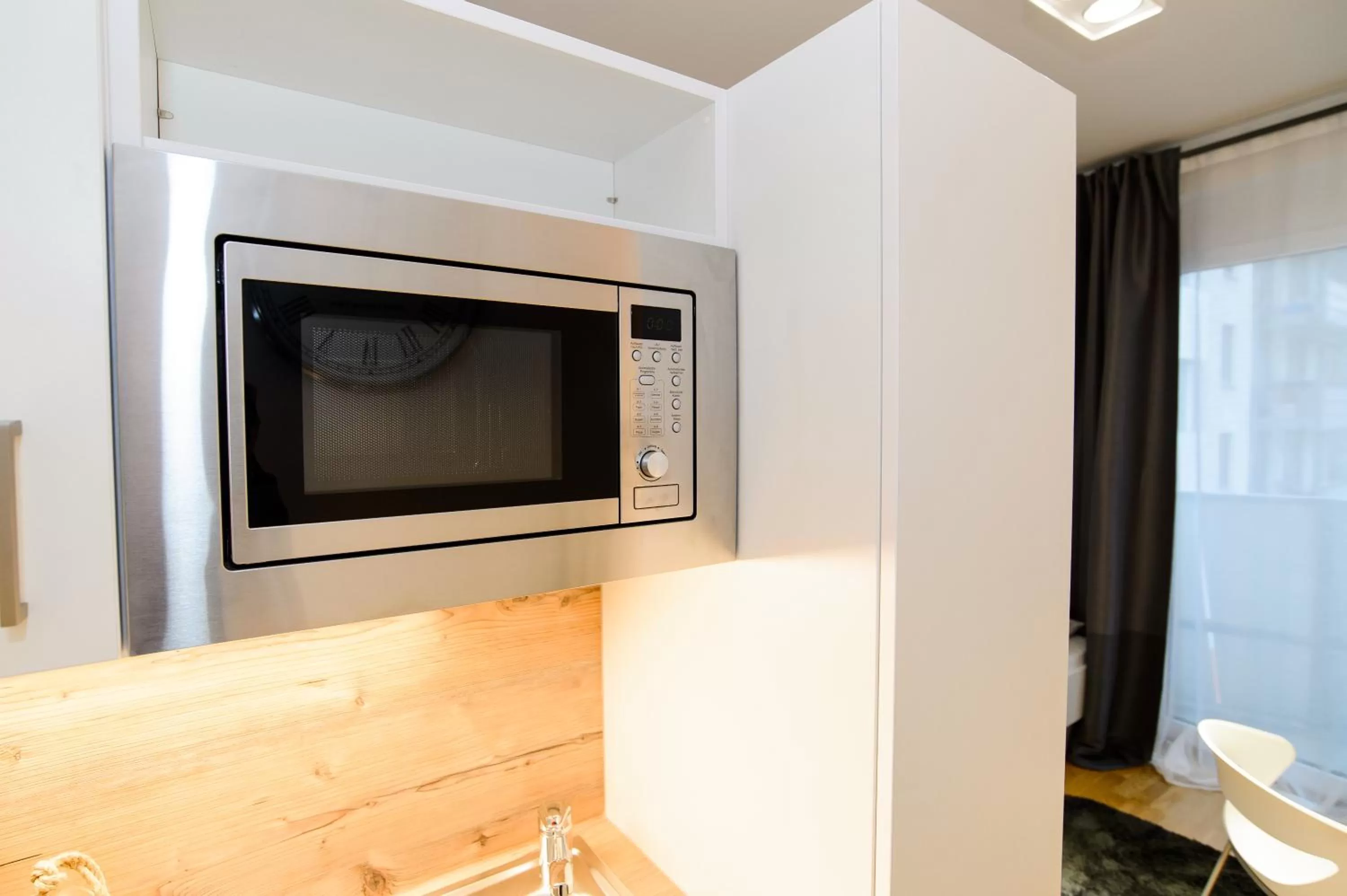 Decorative detail, TV/Entertainment Center in Apart Hotel Messe Munich - my room Apartments